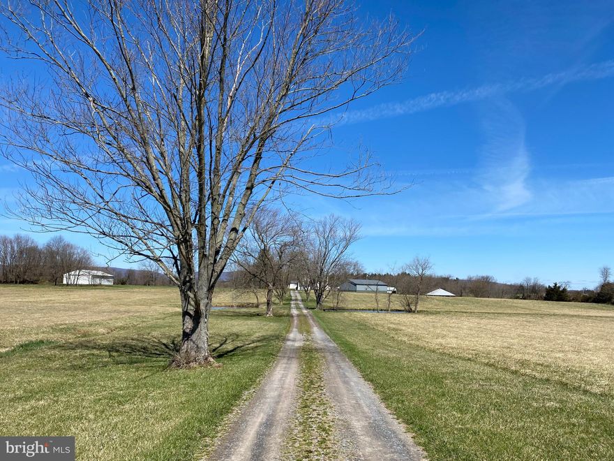 Welcome to Still Meadows Farm 

48.75 acres with breathtaking mountain views for miles. 3 ponds (2 spring/1 creek fed) w/ fish and turtles in all of them. Classic American home w over 3000 sq ft, 5 bedrooms, 3 fireplaces, 2.5 baths. Rear balcony off bedrooms to enjoy breathtaking views & grand front porch to welcome up the 1/4-mile tree-lined lane. Hardwood floors, new HVAC in 2021, and New Metal Roof in 2018. This home has been well cared for! All you have to do is move in. 

So many options! Bring your horses with this 8-stall barn, bring your hay equipment to put in the large machine shed and cut your own hay, with almost 40 acres in hay, Store all your hay in the large Hay Barn. Start your own hobby / business in the new huge pole barn with 3 large bays, concrete floors, lift equipment and plenty of storage.

Come make this wonderful farm your home today!


Just off Old Frederick Rd & Rt.15.