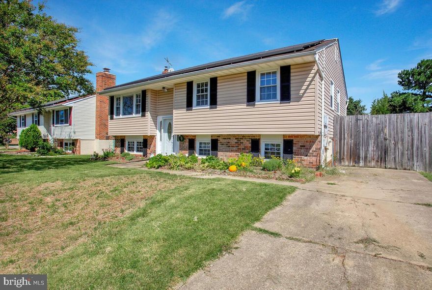 Solid, well-maintained split foyer home built on a generous lot on a quiet cul-de-sac—in a neighborhood that’s close to everything. Upstairs boasts 3 bedrooms and 1 full bath, updated kitchen with ample storage, formal dining and living rooms, and a fantastic 3-season sunroom overlooking the backyard. Downstairs features an oversized family room and bedroom, full bath, laundry room, and workshop (easily convertible to a home office). Walkout to a sprawling, private fenced backyard, perfect for entertaining. Owned and loved by the same family since 1982. Lots of upgrades over the years. Recent improvements include a *brand-new* Trane HVAC heat pump and A/C + 200 Amp electric service (2023). 10-year HVAC system warranty conveys with sale. Energy efficient! Well-sealed home with replacement windows and newer roof, solar panels to be transferred from SunRun, and pellet stove conveys. Freshly painted throughout. Location is unbeatable: minutes to Arundel Mills, BWI, Ft. Meade, NSA, Baltimore, Annapolis, and D.C. Major commuter Routes 100 & 295 on your doorstep. Don’t miss this one!