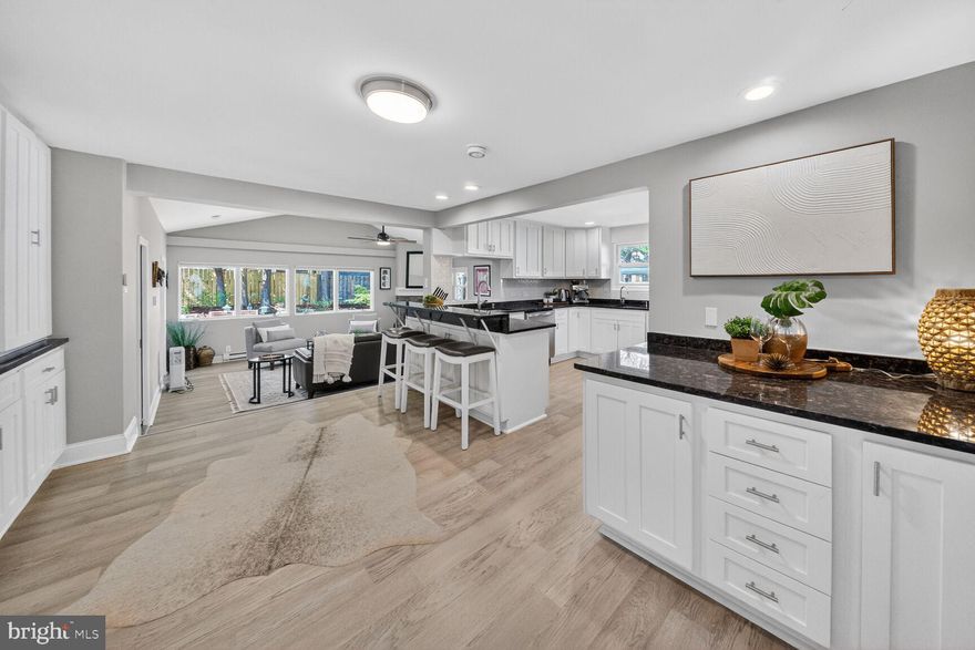 *** Drop in and take a look around! Open House Sunday 5/17, 2:00PM – 4:00PM  ***

High end home with an easy commute!

Refined, Light-Filled Living with Metro only Minutes Away!

Set on a quiet, tree-lined street, this beautifully reimagined single-family home offers a rare combination: sophisticated, move-in ready interiors paired with an easy, short commute to Washington, DC.

Just a short distance to Twinbrook Metro (Red Line), the location allows for a seamless, car-free commute, while still enjoying the space, privacy, and presence of a detached home on an unusually large, beautifully landscaped lot.

Inside, the home is bright, clean, and thoughtfully designed. A fully renovated kitchen anchors the main level, two distinct living areas that balance elegance with everyday functionality and are ideal for entertaining as well as flexible work-from-home living. Expansive windows bring in natural light throughout.

The main-level primary suite offers both convenience and refinement, featuring a renovated ensuite bath with heated floors. Across the home, four spacious bedrooms and three updated bathrooms provide comfort and flexibility for guests, offices, or growing needs. The finished lower level adds versatile space for a gym, media room, or additional living area.

Outdoors, the property sets itself apart. The large, meticulously landscaped yard, rare for this proximity to Metro, creates a private retreat for quiet mornings, entertaining, or simply enjoying the surrounding greenery and birdsong. 

A location that elevates daily life:

Near Twinbrook Metro (Red Line) for direct access to DC.
Only minutes from Wegmans, restaurants, and everyday conveniences.
Close to Trader Joe’s and additional shopping.
Peaceful residential setting with minimal through traffic.
The neighborhood further enhances the lifestyle, with access to a well-established community pool with over 75 years of history (membership required), along with nearby county athletic facilities and green space.

This is a rare opportunity to own a high-quality, move-in ready home that delivers both elevated living and a genuinely convenient commute, without compromise.