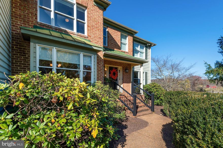 Don't miss this charming quality custom home on 8 acres less than 2 miles from the town business district! Theres so many special quality features about this home! It has spacious rooms throughout, lots of closet space, storage galore, two masonry fireplaces, a newly renovated Trex screened porch, a new SGD between the porch and family room, as well as a massive 42x24 unfinished attic above the garage. It would be perfect as an au pair suite, home office, playroom, additional bedrooms…the possibilities are endless. You can access it from either the garage or through the upper level BR at the top of the stairs on the right. The roof was replaced with architectural shingles in 2018. A beautifully custom-crafted 36x48 center isle barn was built in 2019. The barn has 4 stalls, each 12x12, a tack room, wash stall, run-in shed and a 12x24 concrete floored garage/shop. It also has its own 200 amp dedicated electric service, and hot and cold water. The front porch railing was replaced in 2019 with Trex railing that has lighted post caps.  A new dual fuel/dual zone HVAC system was installed in 2020/2021. The hot water heater was replaced in 2020. Many lighting fixtures in the home have been replaced. Contemporary easy care LVP flooring was installed in 2021 on the main level over the existing hardwoods. New glass tiled backsplash was installed  in the kitchen as well as all the kitchen applicances - wall oven, 4 burner gas cooktop with grill, and dishwasher -were replaced within the last 3 yrs. 
You'll enjoy the serene panoramic views while relaxing on the screened porch just off the family room. It was remodeled in 2019 with Trex decking, railing and screening, plus the SGD entrance to the porch from the family room was replaced in 2022. There's also a very cute patio area with custom built seating benches that's perfect for a  fire pit or cookout gathering. The 3-paddocks and backyard cross-fencing were replaced and re-painted within the past 5 yrs. Three of the bedrooms have en suite bathrooms, and the Primary bedroom has beautiful hardwood flooring and a masonry fireplace. The primary bath has a separate shower, a large jetted tub, double vanities and a large walk-in closet.  A special bonus with this home is the Heatmor Outdoor Wood Furnace system. It's plumbed to the HVAC system heat exchanger and is able to  efficiently and very economically heat the whole house using wood, if desired. It provides a toasty warm heat you'll appreciate and will definitely save lots of $$$ on heating bills!  Call or text Sharon Bucholz with questions. Schedule your showing on-line with Showing Time. If you have trouble scheduling with them please text Sharon with your requests. Thank you!