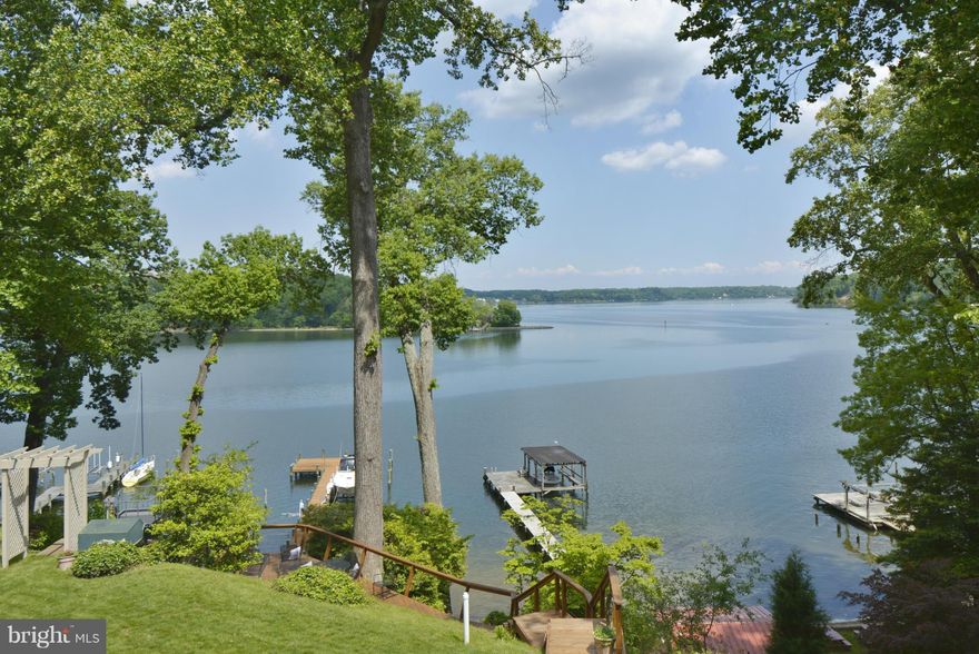 Showing for Back Ups-Custom Built 5 BR Waterfront Home with 8'MLW and Panoramic GORGEOUS Views of Round Bay & Severn River.  LOVE the Walls of Windows, Vaulted Ceilings & Unique Lines, Gorgeous Kitchen w/SS Appliances and Granite Island, Spacious Dining/Great Rooms Open to Deck Overlooking Water, Two Main Level BR, Private Upper Level Owners' Suite and LL Rec Room with Two Bedrooms.  Private Pier