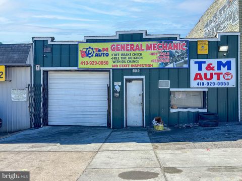 Photo of 655 E 25th Street, BALTIMORE, MD 21218 (MLS # MDBA2210208)