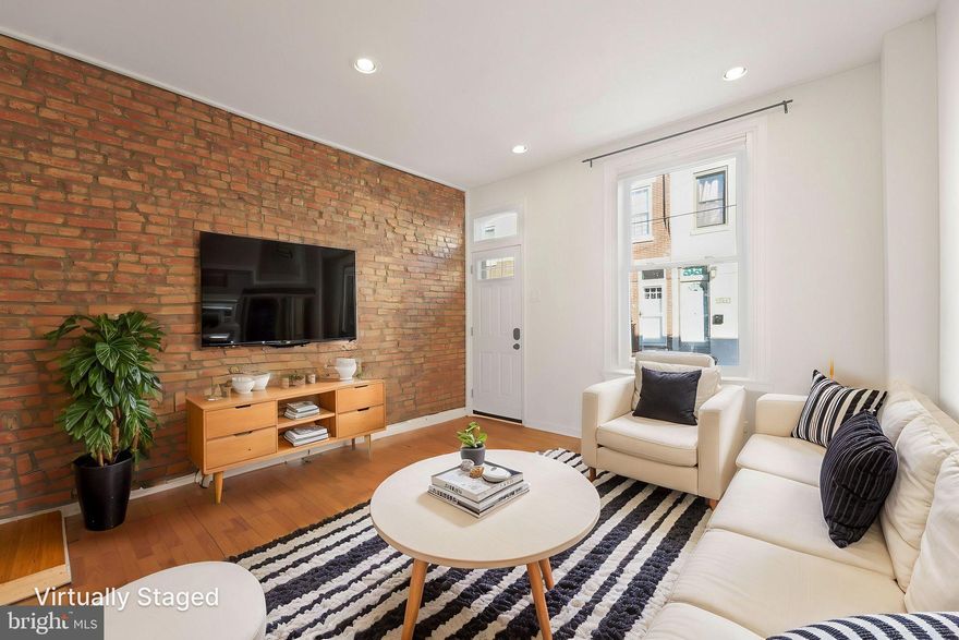 Welcome to 3008 W Harper Street, a beautifully renovated 3-bedroom, 1.5-bath home that blends modern style with timeless charm in the heart of Philadelphia! Located on a peaceful no-outlet street, this home offers both serenity and convenience.

Step inside to discover an inviting open-concept first floor featuring a spacious living room and dining area, a chic powder room, and a newly renovated kitchen. The kitchen is a chef’s dream, complete with sleek countertops, modern cabinetry, and updated appliances. From the kitchen, step outside to the fenced-in rear yard, perfect for hosting barbecues, gardening, or relaxing with friends and family.

Upstairs, you’ll find three generously sized bedrooms and a fully updated bathroom with elegant finishes. The stunning exposed brick wall spans the first-floor living area and continues through the upstairs hallway, adding warmth and character throughout the home.

Situated in a prime location, this home offers easy access to the Philadelphia Zoo, Fairmount Park, and Kelly Drive, for outdoor enthusiasts. Explore local treasures like Eastern State Penitentiary, vibrant restaurants, and cozy coffee shops in the Fairmount/Art Museum area. Grocery stores, boutique shopping, and cultural institutions like the Philadelphia Museum of Art are just minutes away. For commuters, the home is conveniently close to I-76, Center City, and major public transportation routes.