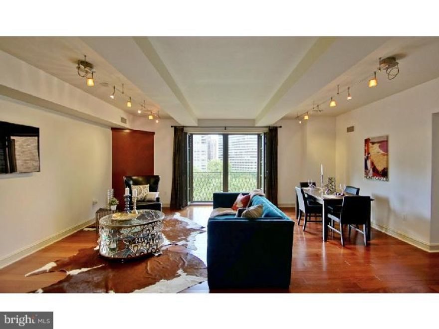 Gorgeous 3 bedroom, 3 full bath with 1 car parking! Living/dining room features floor-to-ceiling French doors overlooking Rittenhouse Square. Master suite with two glass floor-to-ceiling doors and Juliet balconies overlooking the square, ensuite bath and walk-in customized closets. Kitchen with stunning glass tiles, abundant granite counters, stainless appliances including Subzero refrigerator and wine refrigerator. Gas cooking. Beautiful cabinetry. Brazilian cherry floors throughout. Separate laundry. Nest thermostat system. Parc Rittenhouse amenities: pet friendly, 24 hour doorman, outdoor pool, gym, hospitality/business suite. Condo fee: $1346/month. Electric is sub-metered. Gas & Cable are flat monthly fees. Garage fee: $168/month