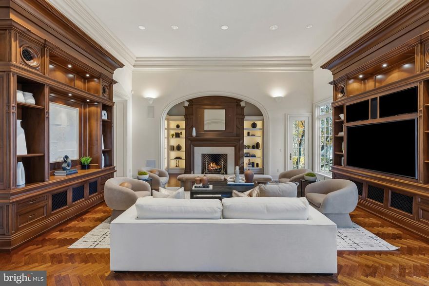 Nestled in the heart of Caves Valley Golf Club and Residences, this completely custom-designed estate offers an extraordinary lifestyle of luxury, craftsmanship, and state-of-the-art systems. With over 11,000 square feet of impeccably designed living space, this home is crafted from the finest materials and features every amenity for a life of elegance and ease.  Upon entering through the marble foyer, you’re greeted by the grandeur of the Great Room, featuring custom cherry built-ins and a striking fireplace wall. The banquet-sized Dining Room is adorned with marble floors and a built-in cherry breakfront, making it ideal for entertaining. A stunning mahogany Library, complete with a fireplace and spiral staircase, leads to the Billiard Room. The gourmet Kitchen, equipped with SubZero, Viking, and Thermador appliances, showcases cherry cabinets and granite countertops. The main level also includes a cozy breakfast area, Butler's Pantry, Wet Bar, Home Office,  Laundry Room, and two half baths.  The luxurious first-floor Primary Suite offers a private retreat, complete with a marble spa bath, two Dressing Rooms, and stunning views. Upstairs, three large en-suite bedrooms, one with French doors leading to a roof deck overlooking Caves Valley, provide ample space and comfort. The expansive lower level features a Billiard Room with wet bar, Game Room, Driving Range/Putting Green, Rec Room, Exercise Room, Additional Bedroom with an ensuite bath,  making it perfect for relaxation and entertainment. Outside, the home’s sweeping patios, covered porches, screened porch with a cooking center, koi pond, and lush landscaping on 2.4 acres create a private oasis. From here, you’ll enjoy the most spectacular vistas and sightlines, capturing the expansiveness of the 8th fairway and green, views of the 9th tee box, and the picturesque Greenspring Valley. This exquisite stone and stucco home, with its cedar shake roof, is perfectly positioned over the signature 8th green and the finishing 9th tee box of the renowned Caves Valley Golf Course. Beyond the home’s impeccable features, residents enjoy access to the Caves Valley Tranquility Center, offering 24/7 concierge services that enhance the ease of everyday living. A short stroll from your doorstep brings you to the first tee or world-class dining, ensuring every moment is as seamless as it is luxurious. Whether you're an avid golfer or simply seeking the tranquility and prestige of this coveted community, this home provides an unrivaled living experience on a truly one-of-a-kind homesite.