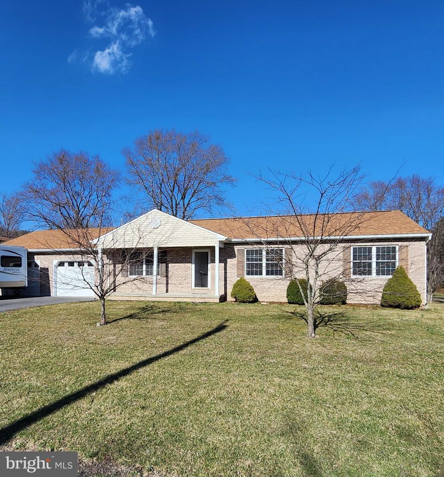 Here is the 1 level rancher you've been waiting for. 3 bedrooms and 2 full baths on one level! The primary bedroom and bath is separated from the other two bedrooms with the living area between. The kitchen and dining area walk out to the private back deck area that will be great for cookouts or entertaining. The 2 car garage is oversized and offers a ton of space for not only your vehicles but great storage as well. The unfinished basement is a blank canvas ready for you to finish. It has roughed in plumbing to put another bath on the lower level. Wait until you see the level lot. It is over half an acre and ready for you to enjoy. Make your showing appointment today.