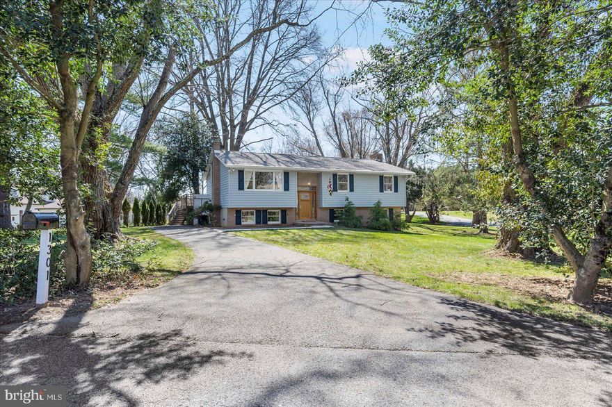 Welcome to 1301 Terrace Court, a wonderfully maintained home in the desirable neighborhood of Strawbridge Estates.  Located in a quiet cul-de-sac, yet SO close to schools, shopping, gyms, restaurants and more!  Once you pull into the driveway, you'll notice the landscaped and tree lined yard, offering plenty of privacy.  This home features lots of natural light, fresh paint, updated lighting and hardwood floors throughout.  In the kitchen, brand new stainless appliances and an updated backsplash and flooring are a great addition to the beautiful wood cabinetry.  Next, you'll find the sun-filled living room and dining area, complete with a beautiful feature wall and french doors leading out to a large, two-level deck that would be perfect for any outdoor gathering.  Further down the hallway,  you'll find an updated full bath, three light-filled bedrooms, including the primary bedroom and a private, updated primary bathroom.  Your feet will be toasty warm in the winter as both main level bathrooms feature heated tile floors! 
Downstairs, the large finished basement includes a half bath, wood burning fireplace, built-ins for plenty of storage and lots of space for entertainment.  You'll also find a generous sized utility/laundry room, complete with a large work bench, cabinets and a brand new washer and dryer.  Walk out the basement sliding doors to just under a half acre lot, complete with a patio and storage shed.  This home is an ABSOLUTE MUST-SEE!