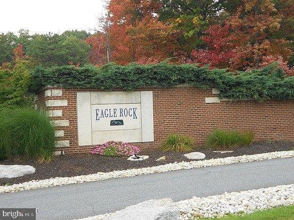 Build Your Dream Home on 0.24 Acres in Eagle Rock Resort! This beautiful 0.24-acre parcel is nestled within the sought-after Eagle Rock Resort, offering the perfect opportunity to create your ideal retreat. Enjoy access to year-round amenities including multiple golf courses, indoor and outdoor pools, a hot tub, full-service spa, fitness and activity centers, ski slopes, and serene lakes. Dine with a view at the elegant Clubhouse Restaurant overlooking the resort's scenic landscape. Come explore this vibrant community—once you visit, you'll want to stay!