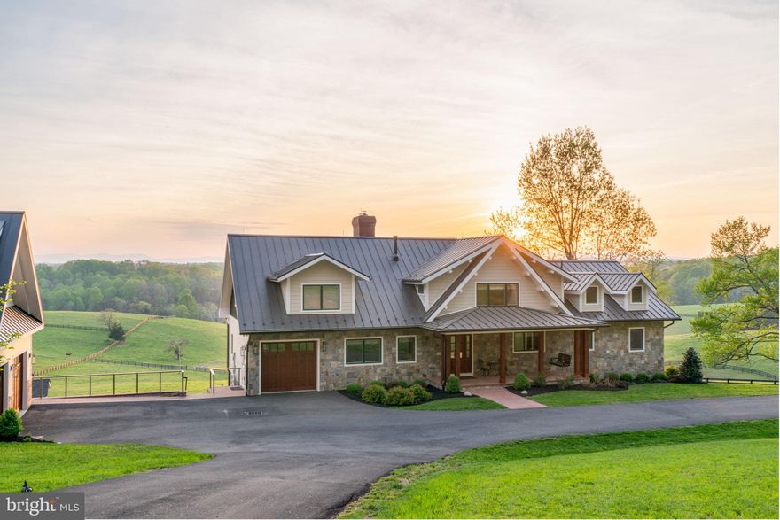 OPEN HOUSE SUNDAY JUNE 14TH 10AM-1 PM, DON'T MISS THIS CHANCE OF A LIFETIME TO MAKE YOUR FARM LIFE DREAMS COME TRUE!
Discover an extraordinary 167-acre estate where luxury living meets unparalleled natural beauty. This breathtaking property, nestled at the end of the scenic Orlean Community Trail System, offers two exquisite homes, a detached garage with an apartment, barns, and a stunning 4-acre spring-fed pond, all framed by majestic mountain views.
The main residence, a contemporary log home, was extensively renovated in 2022–2023, showcasing meticulous craftsmanship. The gourmet kitchen is a chef’s dream, featuring top-of-the-line appliances, custom cabinetry, and elegant granite countertops. The expansive great room, with soaring ceilings, is perfect for entertaining, complemented by a butler’s pantry for seamless hosting. A dedicated home office supports remote work, while the entire top floor serves as a luxurious retreat. The primary suite offers a spa-inspired bathroom with heated floors, a programmable Thermasol steam shower, and a 3-sided Kingsman gas fireplace, plus panoramic mountain views and a private sitting area.
A charming 800-square-foot log cabin, built in 2002, provides modern comfort with 2 bedrooms, 1 bath, and a cozy loft. The detached 2-car garage includes a scenic apartment, ideal for guests. A robust brick-and-block shop, constructed in 2001, features four large open bays, ample workspace, and a half bath.
Perfect for equestrian or farming pursuits, the estate is equipped with a barn, nine Mirafount waterers, extensive underground water lines, and miles of well-maintained fencing. Explore the property via an extensive trail system, or relax by the 4-acre stocked pond with an 80-foot dock and sandy beach. Four smaller ponds, two creeks, three wells, and natural springs enhance the landscape, creating a haven for outdoor enthusiasts.
With 7 bedrooms and 5.5 bathrooms across the homes, this estate offers unmatched versatility. Additional potential includes developing a horse stable with living quarters. Experience the ultimate blend of sophistication, serenity, and self-sufficiency in this one-of-a-kind retreat an hour from DC!!