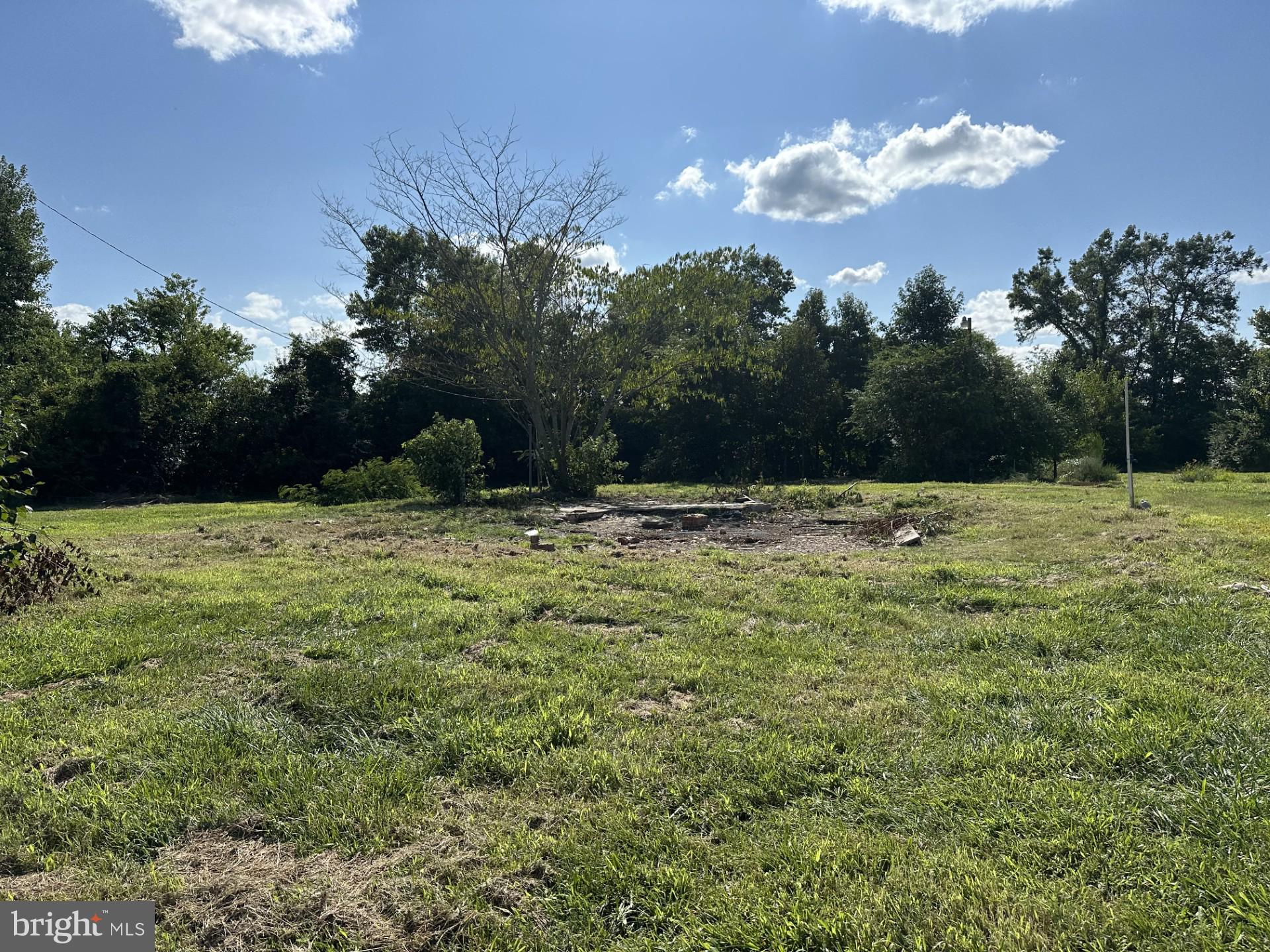 Septic permit paid for and is in the hands of Wicomico Health dept. Here is a rare gem on the Eastern Shore. 1.74 acres of land in the perfect location for your retirement home or a summer get-away. Electric and water are already there. Only 45 min to the Atlantic Ocean or less than 15 mins to the Nanticoke River where you can launch your boat for a day of fishing or crabbing. A few miles to the east and you are in Salisbury, where you will find everything you need for comfortable living. This one of a kind property with good soil stays high and dry even in wet weather and is perfect for growing anything from strawberries to pumpkins.
A new well with two frost-free stand pipes is ready to water your garden along with a cistern from which you could irrigate . The boundaries of the property are outlined by ditches on the front, left side and back of property and the neighbors fence sits on the property line. There was a house on this site but was taken down.