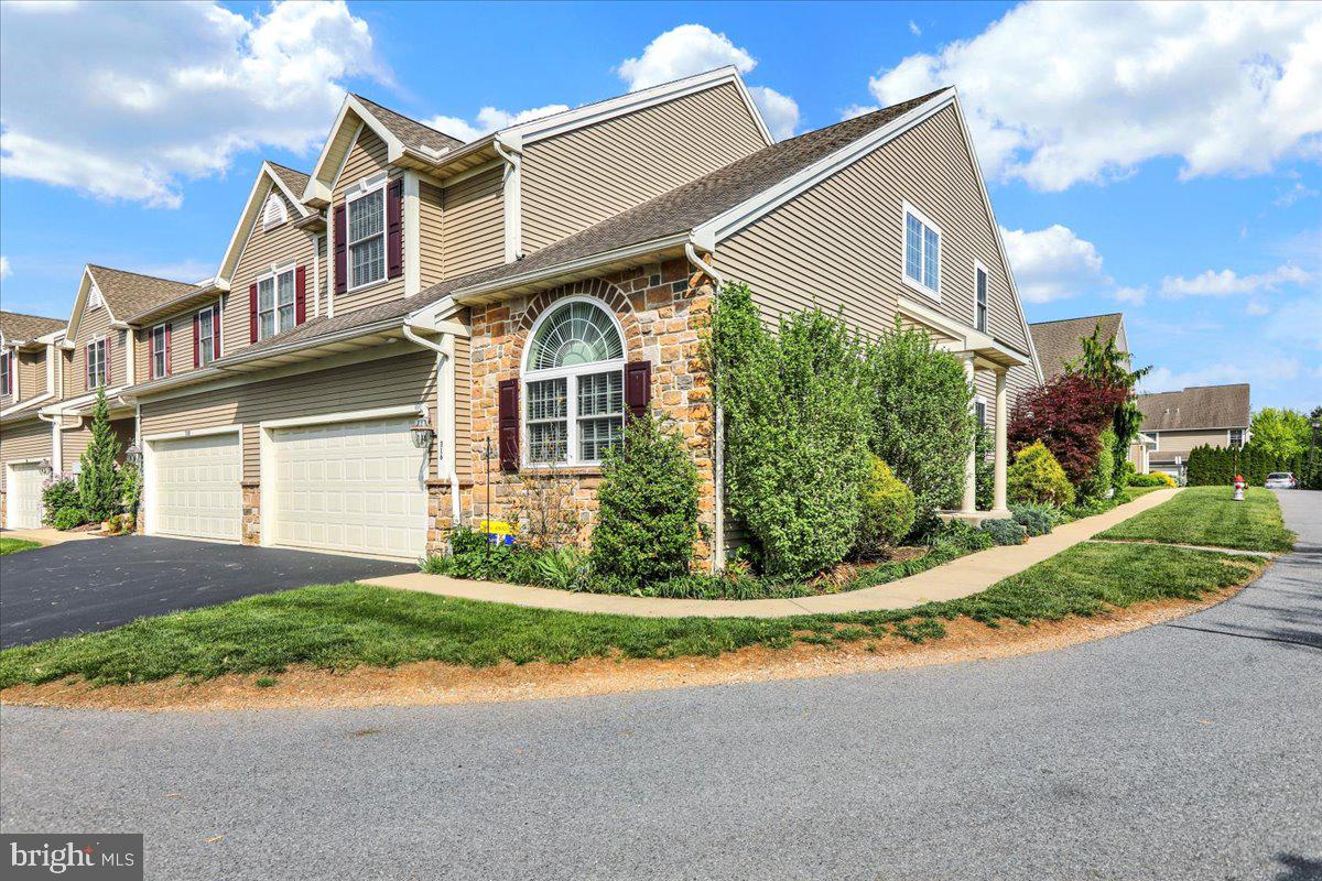 Welcome to 316 Emerald Ln. Located in the desirable Wyomissing area of Reading, PA, this appealing end-unit townhome at 316 Emerald Lane features 3 bedrooms and 2.5 bathrooms, with the primary bedroom on the main level. The inviting living area features a gas fireplace and provides access to a patio with a retractable awning for enjoyable outside entertainment rain or shine! The kitchen is equipped with all necessary appliances. The property also includes a large unfinished basement, perfect for storage or future expansion, as well as a garage with attached, with driveway & street parking. Central air conditioning ensures year-round comfort. The HOA handles common ground maintenance such as snow removal and grass, offering a low-maintenance lifestyle. This townhome presents a wonderful opportunity to own a home in a highly convenient and well-regarded location.