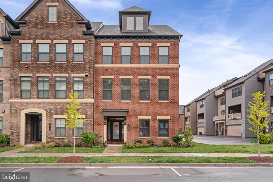 *Applications instructions in Documents.  

Beautiful END UNIT! Marvelous 5-bedroom, 4.5 bathroom, 4 level townhouse with a rooftop terrace, a covered balcony. Enjoy 3694 sq. ft. with 4 levels! 2 car garage, nestled in the highly sought-after Westmoore community! Situated just half a mile away from the Ashburn Metro station, providing convenient access to the city for both work and leisure!

 As you step onto the first floor, you'll be greeted by beautiful, engineered hardwood flooring throughout the entryway. This level offers a bedroom and a full bath adorned with upgraded tiles and quartz counters. 

The heart of this home is the central gourmet kitchen, also has hardwood floors throughout, with granite countertops, stainless steel, backsplash, and huge kitchen island, along with a great room and dining room. The open-concept layout on this floor spans generously and retreat to the privacy of your covered balcony. 

The third floor houses a spacious primary bedroom with a sizable closet (3 of them), while the primary bath is tastefully appointed with quartz counters, upgraded tiles, dual vanities, and dual showerheads. The hall bath on this floor also showcases upgraded tiles and quartz counters. 

The laundry room is equipped with upgraded pedestal with front load washer and dryer.

Venture to the wonderful fourth floor, which not only features a bedroom, closet, and upgraded full bath but also offers an open recreation room. Savor sunrises and sunsets on the rooftop terrace!

Additional highlights of this residence include oak stairs on every level, and privacy blinds. The Westmoore community presents an array of fantastic amenities, including a community pool, fitness facility, clubhouse, picnic areas, grills, two parks with expansive open spaces, a park with an Amphitheatre, a dog park, tot lots/playgrounds, and an abundance of walking/jogging trails. You'll also enjoy convenient access to everyday stores and shops, as well as excellent proximity to the Dulles Greenway (Route 267), One Loudoun, and a mere 10-minute drive to Dulles Airport! Don't miss out on this one!
