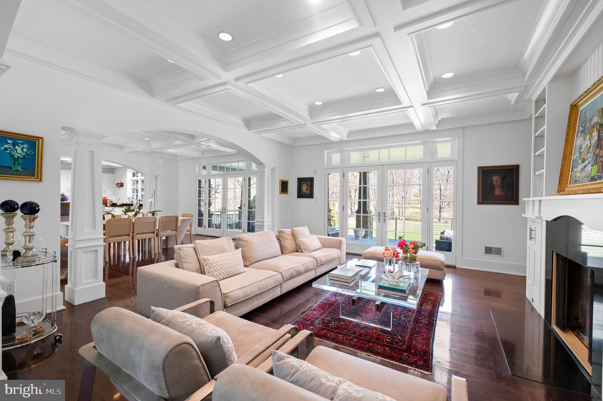 Welcome to your dream home – a masterfully designed 7,400 square foot cedar-sided Hamptons-style residence that exudes elegance and modern comfort. Built in 2006 in the tradition of noted architect Robert A. M. Stern and updated in 2016 by the current owners, this magnificent property sits on 1.66 acres in Bryn Mawr. This 3 story, 6 bedroom, 7 and a half bath home is a harmonious blend of luxury, comfort, and state-of-the-art amenities, making it the epitome of upscale living. As you step into the grand foyer, you are greeted by a stunning staircase that sets the tone for the exquisite craftsmanship found throughout the home. Hand crafted archways and coffered ceilings create the perfect setting for entertaining. The first floor unfolds into a seamless flow of spaces including a sophisticated living room with gas fireplace and formal dining room completed with walls of French doors that open onto the stone patio overlooking the beautiful natural grounds. The bright chef's kitchen is equipped with top-of-the-line Sub Zero and Dacor appliances, butler's pantry and climate controlled wine room. The kitchen's beautiful built-in cabinetry and stunning woodwork extend throughout the first floor, enhancing the aesthetic appeal and functionality of the space. Adjacent to the main living area is a discreet staircase ascending to a cozy library and office/au pair suite with full bath, providing a private retreat within the home. A striking glass-walled hall leads to the entertainment wing, a haven for leisure and enjoyment. Here, you'll find a breathtaking Art Deco tiered theater, offering an unparalleled cinematic experience. Adjoining the theater is a full service kitchen, full bath, and an expansive family room designed for ultimate comfort and style. The entertainment wing also boasts a second-floor gym. From the entertainment wing, you can enter the spectacular outdoor relaxation area, featuring a magnificent slate patio, a pool with a waterfall whirlpool, a stone fireplace, and a built-in grill– all set against the backdrop of meticulously landscaped grounds. The grand main staircase in the foyer leads to the second-floor accommodations, including a luxurious master suite overlooking the gracious grounds, with massive custom his and her closets, built-in cabinetry, and a marble radiant heated bath with a custom two-person glass walled shower and whirlpool tub. Three additional en-suite bedrooms and a laundry room complete the second floor, offering comfort and privacy for family and guests alike. The journey continues to the third floor, where two recently added additional bedrooms, a full bath, cedar closet, and extra storage space await, providing ample room for family or visiting guests. This home is equipped with advanced technology for both convenience and security, including a Lutron lighting system, comprehensive house media system, whole house Generac generator, and five HVAC units. The property also features a large 3-car garage with built-in cabinets, ensuring ample space for vehicles and storage. Located on the prestigious Main Line, in the coveted Lower Merion School District, this home is not just a residence, but a lifestyle choice, offering luxury, privacy, and tranquility. Don't miss the opportunity to own this extraordinary home where every detail has been carefully crafted to ensure unparalleled elegance and comfort.