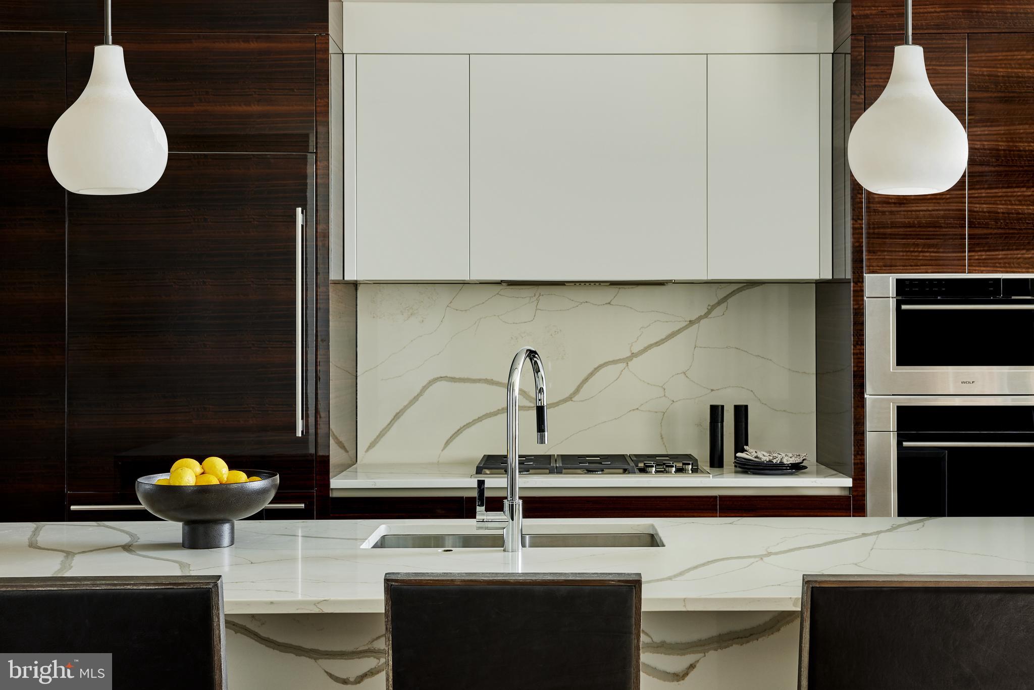 Welcome to The Laurel. Named for Pennsylvania's state flower, The Laurel introduces a lifestyle worthy of this final residential opportunity on prestigious Rittenhouse Square. With hotel-like amenities included for all owners, we offer the carefree enjoyment of city living. The meticulously curated array of services and amenities include an indoor and outdoor saltwater pool along with a stunning club room and expansive terrace overlooking the Square. "Above it All" with panoramic vistas of city and sky, we are the tallest all residential building in Philadelphia. The Sky Residence 2(S2) is a 3 bedroom/3bath unit located on the South West corner. The western views from the expansive wraparound windows in the living and dining areas showcase the beautiful sunsets over the Schuylkill River. Over 2179 square feet of luxury awaits you. Featuring 10 foot ceilings, 8 foot doors and a balcony with views of Rittenhhouse Square, this home is sure to WOW ! The custom built furniture style European kitchen cabinets in a high gloss white finish that flow into open living and dining areas. The appliance package includes a Sub-Zero integrated refrigerator, Wolf gas cooktop, state of the art steam oven and full size convection oven. The oversized kitchen island features Quartz counters with waterfall edges, a large under mounted sink, Dornbracht faucet, Meile dishwasher and under-counter drawer microwave. The primary bathroom is complimented by an expansive shower with Fantini shower fixtures. The luxurious freestanding soaking tub sits atop stunning marble floors surrounded by floor to ceiling porcelain walls. A laundry room with full size Maytag washer and vented dryer complete this magnificent residence. One parking space included. Inquire about additional parking availability. Our on-site Sales Gallery is open 7 days a week.