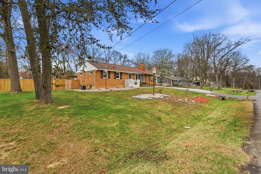 Welcome to this charming and spacious rambler, perfectly situated on a desirable corner lot of over half an acre. This 4-bedroom, 2-bath home offers the ideal blend of comfort, functionality, and outdoor beauty.

Step inside to find a bright and inviting living room featuring a beautiful bay window that fills the space with natural light, along with one of two cozy fireplaces—perfect for relaxing evenings. The thoughtfully designed layout includes a kitchen and dining area that seamlessly walks out to a backyard deck, creating an easy flow for everyday living and entertaining.

The fully finished walkout basement provides additional living space with a second fireplace, offering endless possibilities for a recreation room, guest area, or home office.

Outside, you’ll fall in love with the private, fully fenced backyard oasis, complete with a stunning koi pond and plenty of room to relax, garden, or entertain. Car enthusiasts and hobbyists will appreciate the impressive 4-car garage, expanded driveway, and additional carport, providing ample parking and storage. A brand-new shed with electricity adds even more versatility for workspace or storage needs.

This unique property combines peaceful outdoor living with practical amenities—don’t miss your opportunity to make it yours!