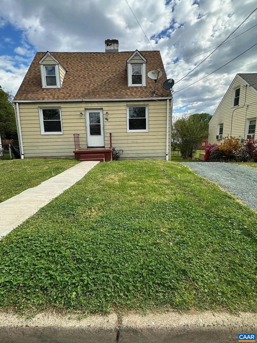 3 Bedroom 1 1/2 Bath ready to be updated with your personal touch. 1116 sq.ft with a full basement. Original arched doorways and hardwood floors throughout. The large partially fenced back yard perfect for gardening or pets. Centrally located in the heart of Belmont. Property is being sold "As Is" but inspections are welcome.,Fireplace in Family Room