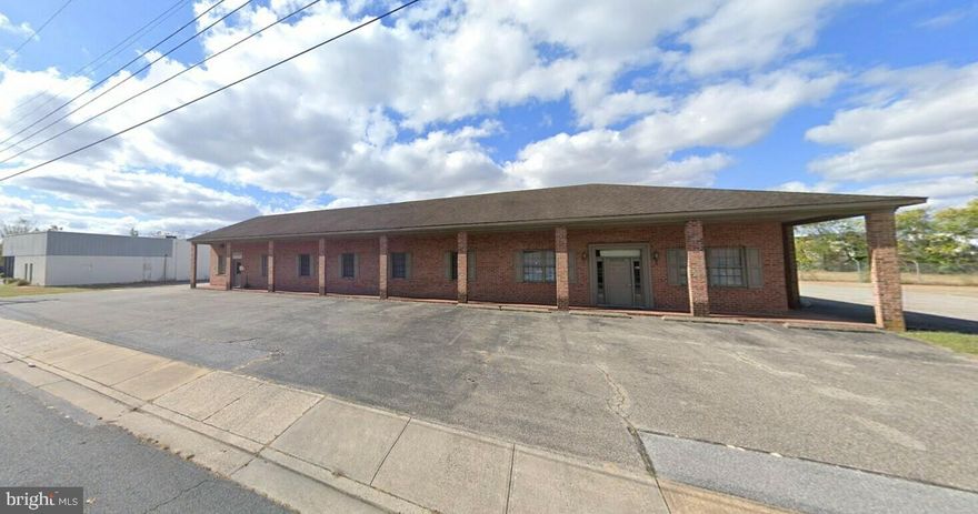This light industrial property consists of a 4700+/- SF brick office building with a free-standing 1300 SF warehouse situated on 1.67 acres.  The office building is currently set up into three (3) office suites but it could potentially be combined into one suite. The property is partially fenced for secure outside storage.  It is zoned light industrial and has public water & sewer service.  There is a large attic space for additional storage. 

The property has served its previous occupant very well for a long time and this is the first time it has been offered for sale in nearly 20-years.