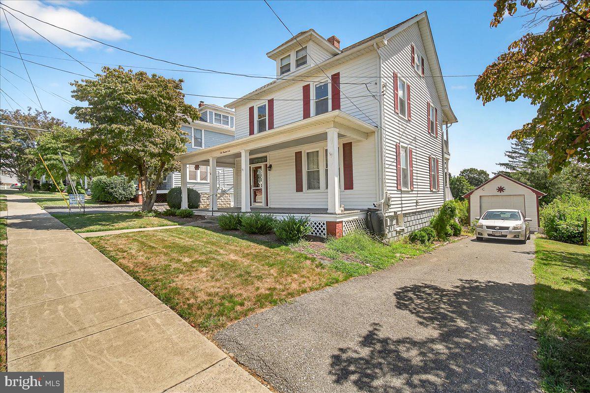 Great opportunity to own in the heart of Middletown and is ideally located within walking distance to schools, parks, restaurants, downtown Middletown, shopping, and more. This 3 bedroom 2 full bath with spacious finished attic area for a possible 4th bedroom has been well maintained and still possesses much of its nearly 100 year old character and charm. Features include original hardwood floors, large wrap around porch, 1/4 + acre level lot, 1 car garage, shed, family room addition built in 2005 and more. New roof installed in 2021 and water heater 2024. Sold As-Is.