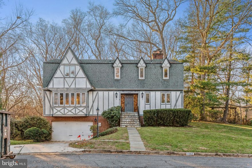 Elegant Tudor style colonial set on a premium .47 acre lot and quiet cul-de-sac backing to 5+ acres of HOA land. This location could hardly be improved upon.  Walk to its sought-after pyramid of schools Churchill, Cooper, and Langley HS.  McLean library, McLean Community Center and downtown McLean are within a mile.  Tysons Corner and McLean metro are less than 3 miles.   This home is a Commuters dream. Let us know if you can find a better home - with quick access to 495, George Washington Parkway, route 6 and 267.  So, so convenient for DC, Tysons' Corner and two airports, Dulles and Reagan.  Many parks are also close by for nature lovers to include Scotts Run, Turkey Run and Great Falls Park. There are five bedrooms, generously sized, three full upper-level baths and two powder rooms, one on the main level and one on the lower level. The bedrooms all have hardwood flooring, and the hallway has hardwood underneath existing carpet   The main level has a large living room, dining room, large open kitchen and family room and lovely study with a fireplace for working remotely.  Hardwood exists under carpet.  There is also a mudroom/laundry area just off the kitchen with a separate side entrance.  The lower level with a gas burning fireplace and bar walks out to patio for BBQs, flat usable yard for children's play, not to mention dogs, just add a fence. Idyllic views of woods and trees. Plenty of privacy.  HVAC replaced in 2021. Two car garage.  Don’t miss the opportunity to purchase this wonderful home in sought after neighborhood.  Home is being sold “as is” and waiting for your design ideas and decorating flair or build a new one.  Local property values go up to $10m.