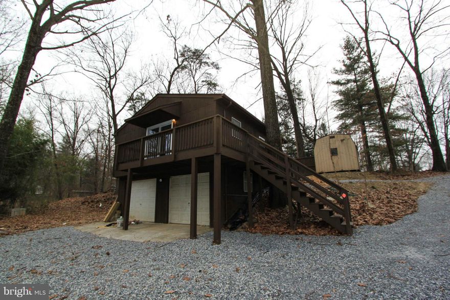 Charming  rental home situated above large two car garage. Hardwood floors throughout, open kitchen with dining area and L shaped counters. Long, private driveway and large fence located minutes from commuter route 9. Rent includes filters and renters insurance. EHO.