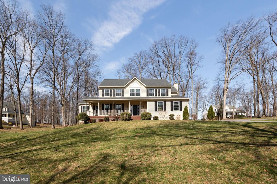 Welcome to 3312 Heavenly Cause Ct, a beautifully 4-bedroom, 3.5-bath home, set on 2.22-acre lot located in the desirable Mt. Airy community. A front porch and newer front door create an inviting first impression. Hardwood floor throughout the main and upper levels. The main level features a large office with vaulted ceilings and abundant natural light, a separate living room and a formal dining room. The eat-in kitchen features granite countertops, generous cabinetry, electric double oven, and opens to the family room. The family room offers a striking stone-accented wood-burning fireplace. The rear deck is perfect for grilling or simply relaxing. Upstairs, the primary suite has a vaulted ceiling,  a soaking tub, a separate shower, dual vanities and a walk-in closet.  Three additional bedrooms, a full bath, and a convenient laundry room complete the upper level. The fully finished lower level expands the living space with a wet bar, a refrigerator, a water filtration system, a full bathroom and a storage area. A French door leading to the outdoor, plenty of room for gardening, recreation, and pets. Behind the house, there is a detached shed. Some updates include - Roof replaced 2023; Presidential Exteriors windows, doors, and gutters installed in 2025, lifetime warranty; expanded 4000SF parking lot 2023. Septic cleaned in 2025. convenience of nearby golf, a full-service restaurant and pro shop, as well as easy access to shopping, dining, and I-70. Enjoy comfortable living and scenic surroundings in this home. Sell as is.