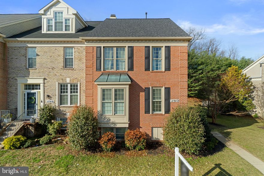 Beautifully updated End of Group townhouse in the sought-after Chapel Gate community! This 4-bedroom, 3.5-bath home offers a perfect blend of comfort and modern convenience with an abundance of natural light. The main level features gleaming refinished hardwood floors and a cozy living room with a built-in gas fireplace, perfect for relaxing evenings. The dining area includes spectacular custom built-ins, adding character and functionality. The updated kitchen boasts modern appliances (built in keurig in refrigerator), and the bedroom-level laundry room, upgraded in 2020, adds extra convenience. The spacious primary suite includes a private bath, while the additional bedrooms offer ample space, hardwoods throughout and so much natural light. The roof and skylight are only four years old, and the windows, flooring, plantation shutters and appliances have been updated as well. Lower level features family room with additional gas fireplace and bedroom or wood shop as current owners have used it for. Tons of storage and updated bath. Outdoor living is a breeze with a deck, retractable awning, and a fenced rear yard with a patio ideal for entertaining or enjoying quiet afternoons. This move-in-ready home is a rare find. Don't miss out schedule your showing today!