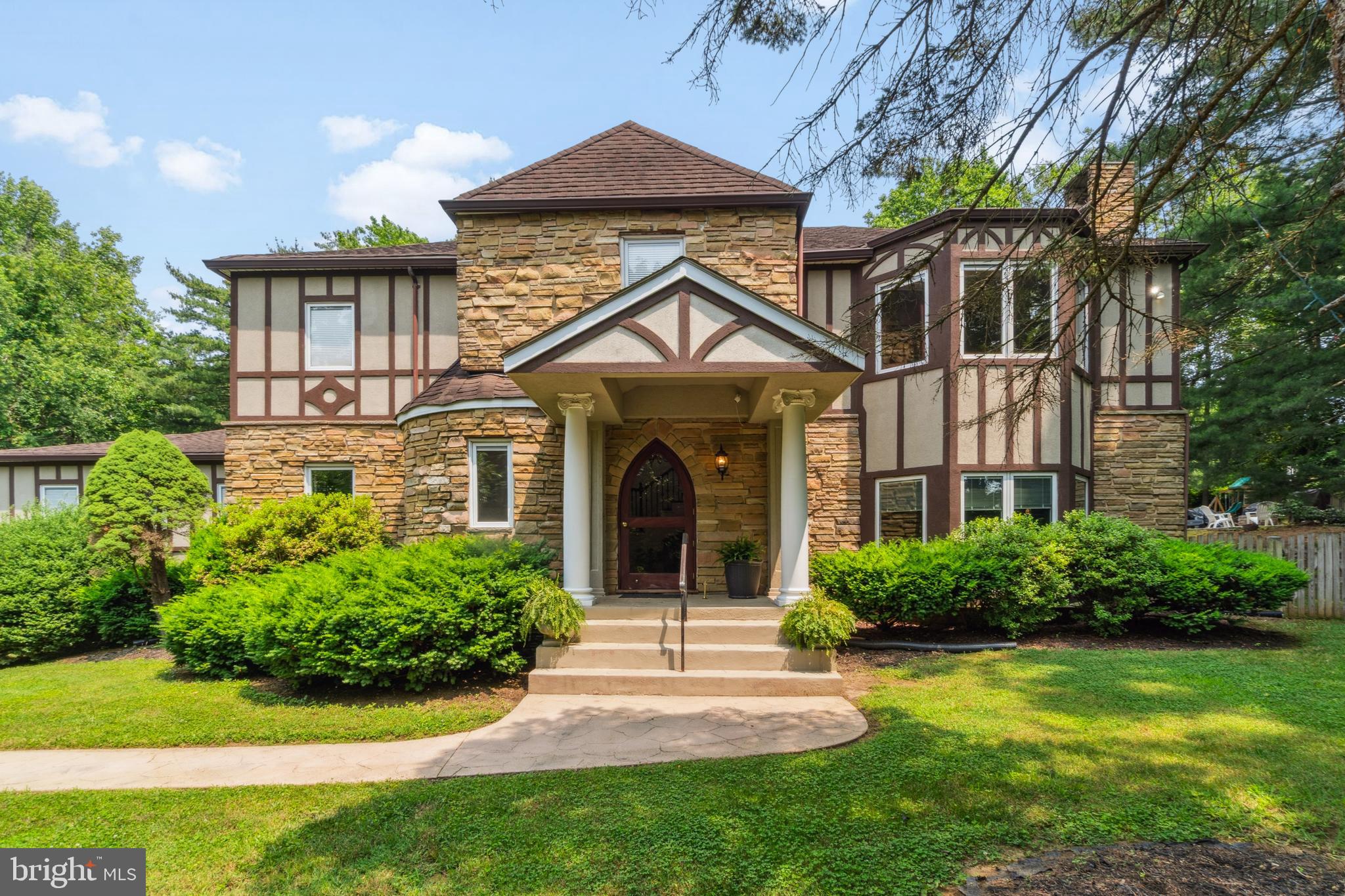 Beautiful custom built 4 BR | 4.5 BA all stone Tudor with 2 car garage and inground heated pool right in the heart of the Broadneck Peninsula! This home was completed in 1980 by a local architect with incredible attention to detail and features top quality finishes throughout all 4800 SF of finished living space. The two story Foyer is a focal point of the home as you enter through the stunning Gothic arched front door into the Foyer with rounded walls & archways all leading to an open-concept main level with high ceilings and abundant natural light. Other features include two Family Rooms (one is 24 x 24), an extra large gourmet Kitchen equipped with solid oak cabinetry, granite center island, stainless appliances and pantry with convenient built-in trash shoot. There is also a roomy Sunroom addition with floor to ceiling sliders leading to the large fenced in yard, custom inground heated pool, cabana with full Bath, firepit and patio, an ideal space for outdoor entertaining and weekend fun.
The Living Room and 2nd Family Room showcase two stunning custom built fireplaces (one gas and one wood burning) creating a cozy and inviting atmosphere. The spacious formal Dining Room is off the Kitchen and can accommodate large furniture pieces. The property sits on a nice 1 acre wooded lot providing a private and serene setting. Public utilities and NO HOA rules and regulations for this one-of-a-kind property!
The upper level features the expansive primary BR suite boasting a sizable walk-in closet and an ensuite Bathroom with dual vanities, separate shower and soaking tub. Also on upper level is laundry and 3 additional well-proportioned BR's, one with deck overlooking pool and firepit, and full Bath providing ample space for bedrooms or home offices. The Lower Level is unfinished except for second laundry and full Bath offering lots of expansion possibilities.
Located on the new Broadneck Peninsula Trail connecting Broadneck to Sandy Point State Park and Beach. A truly unique opportunity for the right buyer!