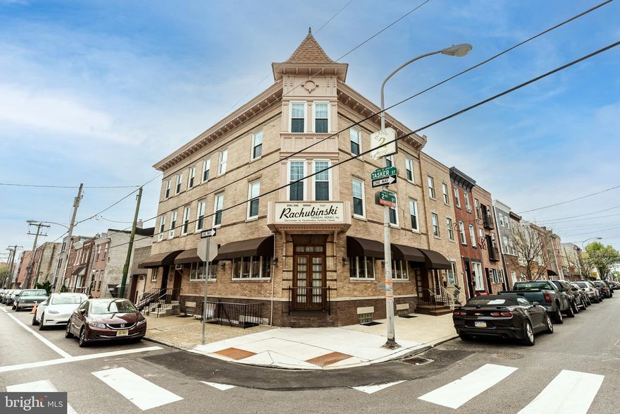 Discover a unique opportunity at 1601-03 S 2nd Street, where a remarkable piece of real estate awaits. This double-wide corner building, measuring 32x63 feet, resembles a castle and offers over 5,500 square feet of living space. Zoned for Residential/Multi-Family use, this property is perfect for those seeking a blend of business and residential living.
The building boasts an architecturally pleasing exterior, featuring a beautiful brick façade and exquisite woodwork. With four separate entrances, the space offers ample flexibility and functionality. Numerous windows throughout the property provide natural light, while a deck allows for relaxation. Additionally, a private garage offers convenient parking.
First Floor: The first floor most recently served as a business space, spanning approximately 1,300 square feet (excluding the garage). This level includes: A spacious foyer, high ceilings, surrounding windows, a private office & two bonus rooms perfect for customization.
Second Level: Main Residence. The second level covers approximately 1,800 square feet (excluding the deck) and features a meticulously maintained double-wide living room  with high ceilings, a gas fireplace, and built-in bookshelves. The dining room is expansive with hardwood floors, custom wainscoting, and a wall of windows. A well-equipped kitchen with wrap-around windows, ample cabinets, and stainless-steel appliances. Three bonus rooms, a walk-in cedar closet, powder room, laundry room and a sizable deck.
The Third Level is approximately 1,300 square feet & houses the primary bedroom featuring walls of windows with city views. Also a huge walk-in closet and a full bath with both a shower and tub.
Additional Bedrooms: Four light-filled rooms with great closet space and another full bath.
Potential Roof Deck: The flat roof above this level offers potential for a roof deck.
Lower Level: The lower level continues the first-floor business space with approximately 1,300 square feet, including: family room, quiet room, lounge, bonus room, a full eat-in kitchen, two utility rooms & two powder rooms.
This rare gem presents countless possibilities! Whether you envision it as a multi-family residence, a business hub, or a combination of both. 1601-03 S 2nd Street is a must-see property. 
Don’t miss this once-in-a-lifetime opportunity to own a truly special building.