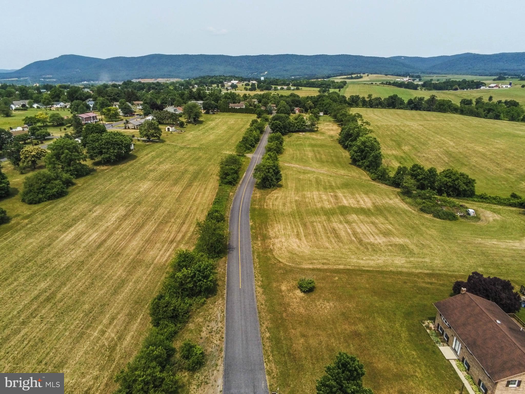 16 "Country Feel" building lots in established neighborhood! Priced $21,500 each (together price). Public water & sewer available. Electric on site. Nice flat lots. (4) with walk out basement potential. Builder take down plan possible. These are approved lots that need water & sewer extended. Great situation for builder/developer...BUILD SOME HOUSES! Additional lots available (See FL2014294) + over 30 acres for future development available. Call for details!