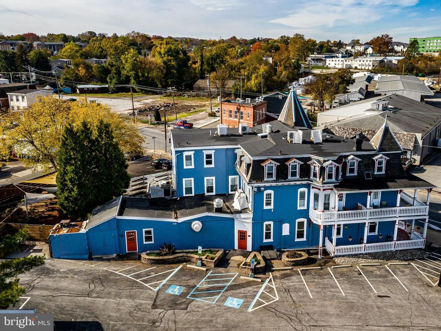 Phoenixville Investment Opportunity.​ 400 Bridge Street Phoenixville PA Chester County.​ The new cornerstone of Downtown Phoenixville is 400 Bridge Street.​ The west end of Bridge Street will be rapidly developed over the next few years with over 900 residential units added just a few blocks away.​ This is a turn-key property, with a no expense spared rehabilitation over a 1 year period in 2020-21.​ All major systems have been replaced with superior material that would ensure low maintenance and longevity.​ 


COMMERCIAL • Mixed use two detached commercial buildings and two adjacent parking lots.​ Major renovations made to property in 2021 • Main building 1st floor retail space occupied by La Patrona leased through November 2026 (with annual increases and lease extension option) .​ Detached Stables Building occupied by Angry Jacks Axe Throwing; leased through March 2026 (with annual increases and extension option).​  

LIQUOR LICENSE INCLUDED WITH SALE • PA R-Liquor License 

RESTAURANT EQUIPMENT INCLUDED WITH SALE- All Restaurant Equipment and Fixtures are Included with sale.

RESIDENTIAL • Nine (9), fully occupied, one bedroom apartments in main build- ing.​ All units had a complete renovation in 2021.​ Units feature new granite counter tops, stainless steel appliances, new bath- rooms, washer and dryer in each unit.​ One off-street parking space per unit.​ 

NEIGHBORHOOD • Prime location with new residential construction to be completed in the immediate area.​