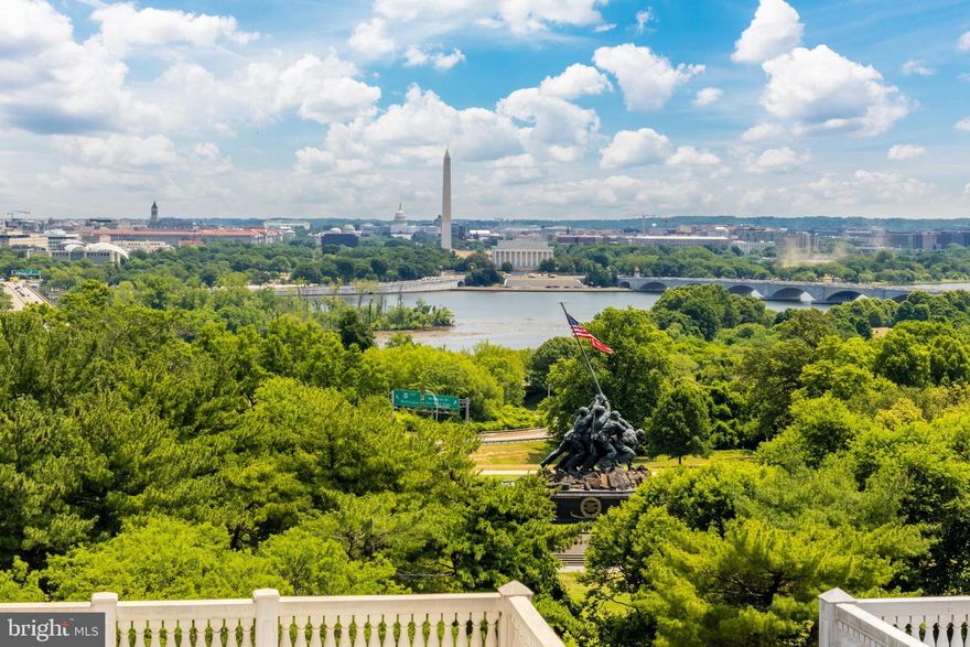 Elegant living in this expansive five-level brick row house with stunning rooftop views.  
The convenience of the Rosslyn Metro and Arlington Cemetery Metro stations just minutes away allows for easy commuting.  This prime location is also in close proximity to Arlington Heights Historic District, Pentagon City, Downtown DC, Georgetown, Gravelly Point, and Ronald Reagan National Airport.