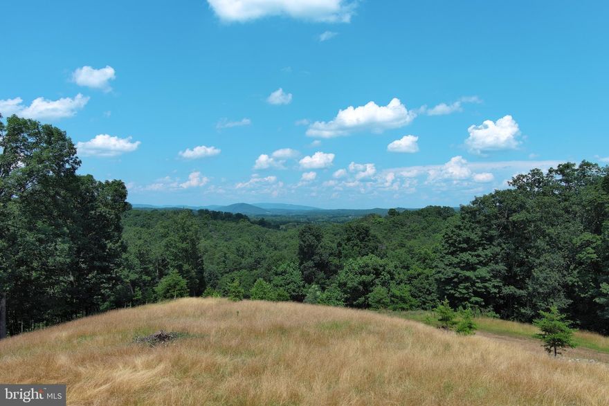 UNRESTRICTED......7 PRIVATE GORGEOUS ACRES WITH DRIVEWAY INSTALLED TO MASSIVE CLEARED HILL TOP BUILDING SITE OFFERING LONG RANGE MOUNTAIN VIEWS TO THE NORTHEAST. PARK LIKE SETTING AT THE BOTTOM WITH SMALL SEASONAL STREAM. SAVE BIG $$$$$$ ON INFRASTRUCTURE COSTS UP FRONT.....THE DRIVEWAY AND CLEARING WOULD EASILY COST 20K IF YOU WERE STARTING FROM SCRATCH, IT APPEARS THAT THERE'S ELECTRIC CONDUIT BURRIED TO THE BUILD SITE....800 FT X $10 PER FT = 8K AND THERE'S EVEN A SMALL STORAGE SHED.....25-30K WORTH OF INFRASTRUCTURE ALREADY COMPLETE, WHICH MEANS THAT'S 25-30K YOU DON'T HAVE TO SPEND.  PERKED FOR CLASS 1 SEPTIC SYSTEM IN 2013. THE BUILD SITE IS TOP NOTCH, BIG ENOUGH FOR ANY SIZE HOME AND POLE BUILDING...IT'S PRIVATE AND THE VIEWS ARE AMAZING. EASY TO GET TO BUT HARD TO FIND....ONLY 1/4 MILE OFF THE PAVED ROAD, JUST 5 MILES FROM THE THRIVING VILLAGE OF FORT ASHBY, 30 MINUTES FROM CUMBERLAND, MD AN HOUR FROM WINCHESTER, VA AND 2.5 HOURS FROM DC METRO. YOU MAKE THE RULES HERE....NO RESTRICTIONS + NO HOA = NO PROBLEMS! IT'S EXTREMELY DIFFICULT TO FIND ACREAGE IN THIS AREA, MUCH LESS ACREAGE OF THIS QUALITY.....HERE'S YOUR CHANCE...DON'T BLOW IT!