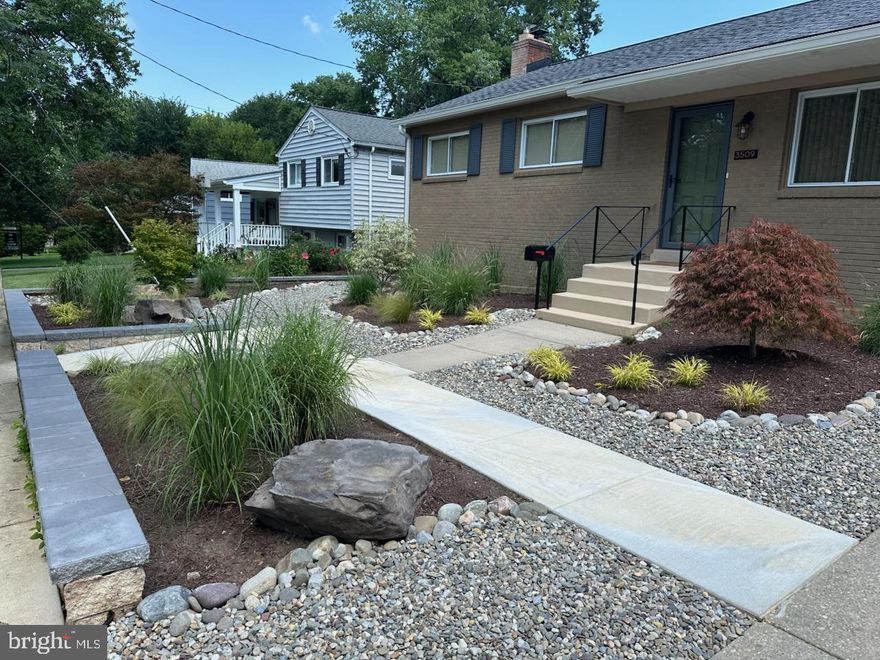 OPEN HOUSE Saturday, 3/14, 12:00-3:00 PM, This impeccably maintained 4 BR/2.5 BA home is a private sanctuary of elegance & comfort. Refinished hardwood floors flow seamlessly throughout the main level, creating a warm & inviting foundation for the home’s open layout. The chef’s delight kitchen features granite countertops, stainless steel appliances & a breakfast bar, opening to a spacious living & dining area anchored by a Vermont Castings gas fireplace w/ a modern tiled hearth. Sunlight streams through windows dressed w/ tasteful, contemporary treatments, while a sophisticated, modern light fixture adds a polished elegant touch. Off the kitchen, a bright enclosed sunroom extends the living space & flows directly to a new Trex deck, overlooking a fully fenced enchanting backyard retreat, featuring Japanese Maples, stone accents, a patio & a firepit—perfect for intimate gatherings or serene relaxation.  4 BRs on the main level include a versatile office or dining room & a large primary suite. The hall bathroom is a true showpiece w/ exquisite tilework & luxe fixtures.  The finished lower level expands the living space w/ a recreation room featuring a Vermont Castings wood-insert fireplace, pristine epoxy flooring, a refreshed half bath & flexible areas for a home gym, playroom, or hobbies.  Premium upgrades include a Trane HVAC system w/ AprilAire humidifier, new electric panel w/ 200 amp heavy up, 50 gallon hot water heater, GE washer & dryer, new stainless steel utility sink & refined interior & exterior finishes just minutes from Kensington shops, Metro & Rock Creek Park!