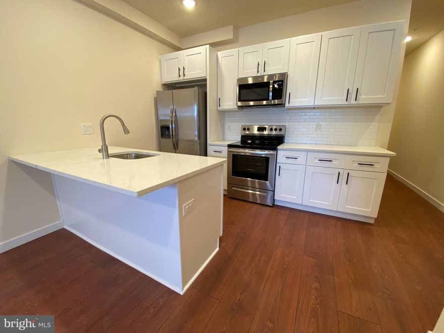 Fully rehabbed apartment building in the Kingsessing section of Philadelphia located at 52nd & Chester is now accepting rental applications. Unit consist of 2 & 3 bedrooms, and offer unmatched designs and pricing. All units come standard with 5-1/2" plank hardwood flooring, stainless steel appliances, central A/C, washer and dryer (in-unit), coffered and accent wall designs, intercom and e-keypad access, and so much more! Specific unit listed is located on second floor, includes stacked washer and dryer, and is managed by reputable property management company with over 500 rentals in the immediate area.