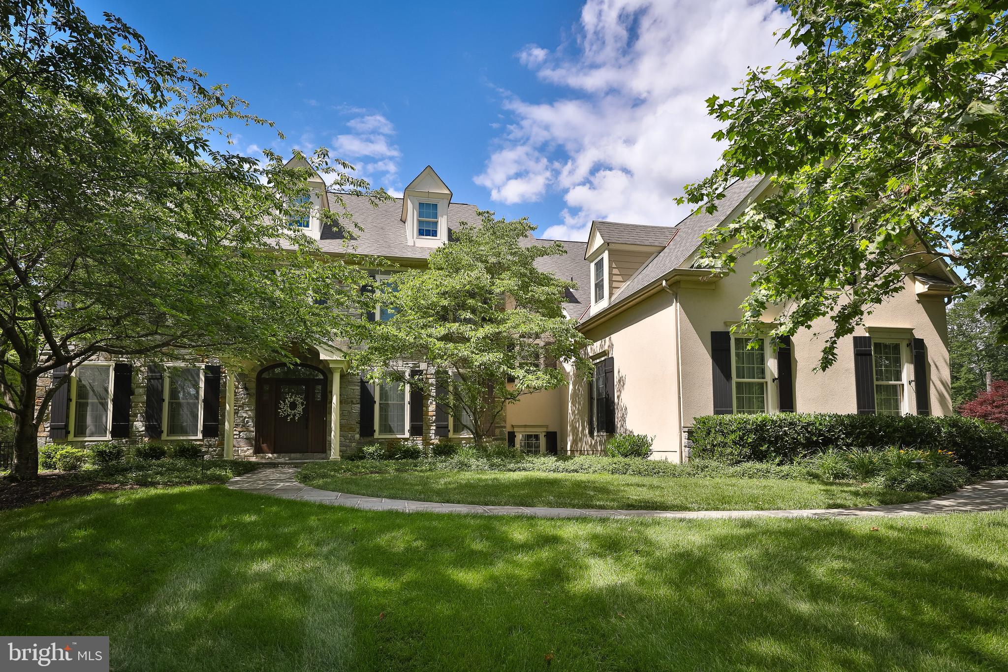 Now is your chance to call this custom built, Colonial Farmhouse “HOME!”  Located in the desirable Parsons Glen neighborhood, this house boasts four floors of fun, and includes 7500 SQ FT of Living Space.  There are many highlights to the interior of this home, but among my favorites, is the renovation of the Kitchen, Family and Mud Rooms featuring custom wood beams, terra-cotta flooring, soapstone countertops framing a deep farm-sink, and a gas fireplace with stone surround.  Designed to entertain indoors and outdoors, this floor plan offers both formal Living and Dining Rooms as well as a custom home office with built in desks, shelving, storage and tempting views of the EXQUISITE back yard. If you’re lacking the talent to whistle while you work, the 12 speaker, custom SONOS audio system can quickly come to your aide and play your favorite selection of music for work, play or your next soiree! For anyone needing to do “the wash”, the Laundry Room at 1471 Parsons will quickly become your FAVORITE with its two (2) sets of washers and dryers.  Access the lower level or 2nd floor from one of two sets of stairs—the newly carpeted back stairs lead to the Kitchen or four of the 2nd floor Bedrooms--two of which share an adjoining bathroom with dual vanity, and a separate water closet with tub-shower. The other two freshly carpeted bedrooms are equally well-appointed and share a hall bathroom featuring a dual vanity and tub-shower. The Owner’s Suite is spacious, highlighting a volume ceiling, make-up vanity, multiple closets—including a walk-in and a sitting room that could be transformed into a home office or an additional large, walk-in closet. Clean and Neutral bathroom has a dual vanity, jetted tub, and a stall shower. The third-floor suite may have your children, in-laws or au-pair fighting for this amazing, light-filled, separately zoned space with a FULL bathroom and walk-in closet. The lower level with its own powder room, does NOT disappoint and offers room for gaming, recreation, gym, or media while still including loads of STORAGE. The pièce de resistance: Custom 20’ x 40’ (refinished in 2019) in-ground pool with (NEW) retractable cover, newer heater, and separate operating Hot Tub which you’ll need to cool off or cool down after your full workout on the “Superior Play Systems” multi-function Sport Court. Featuring three adjustable basketball goals, and a multi-sport net all on a non-skid surface which will defy even the most ardent of tennis, pickleball, badminton or volleyball players. The custom box lighting will allow the fun to continue into dusk. When all that activity has made your guests or children hungry, the convenient, built-in gas grill and expansive paver patio have designed to host the masses! If you're in need of a quick refresh from all of your outdoor activity, don’t worry, because the pool house is only steps away and there is another full bathroom  with stall shower. Custom, perimeter fencing with stone pillars and lighting frame out this picturesque and fun backyard. Top-Ranked Wissahickon Schools, access to beautiful Lower Gwynedd parks and trails, Shopping, Restaurants and proximity to rail, Route 309, PA Turnpike and I-476 should put this home at the top of your buyer's list! Want to see more? I’d love to take you for a private tour!