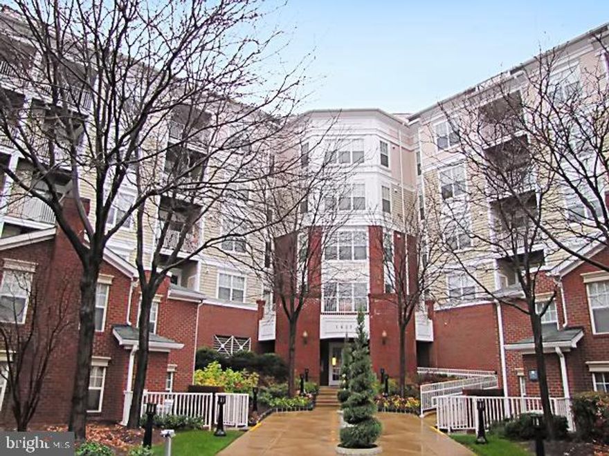 Located in the heart of the Tysons Corner Business District, this large 988 sq ft top-floor condo offers a blend of comfort, style, and convenience. With 1 bedroom, 1.5 baths, and an open floor plan, this home is designed for modern living. Hardwood floors flow throughout the main living space, while the updated kitchen features granite countertops, stainless steel appliances, and ample cabinetry—perfect for both everyday meals and entertaining.

The spacious living room opens onto a separate enclosed sunroom, offering additional living space and beautiful area views—a wonderful spot to relax, read, or enjoy your morning coffee year-round.

The large primary bedroom serves as a private retreat with generous closet space, a full walk-in closet, and a spa-like en-suite bath. Additional highlights include a full-size washer and dryer in the unit and an elevator for easy access to this top-floor residence.

Enjoy resort-style amenities, including a swimming pool, exercise room, and a party room for gatherings. Step outside and you’ll be within walking distance of Tysons Galleria, world-class dining, and boutique shopping, with quick access to Metro stations and major commuter routes for an easy trip into D.C. and beyond.

This move-in ready condo offers not only a stylish living space but also a lifestyle defined by convenience, amenities, and one of Northern Virginia’s most dynamic locations.