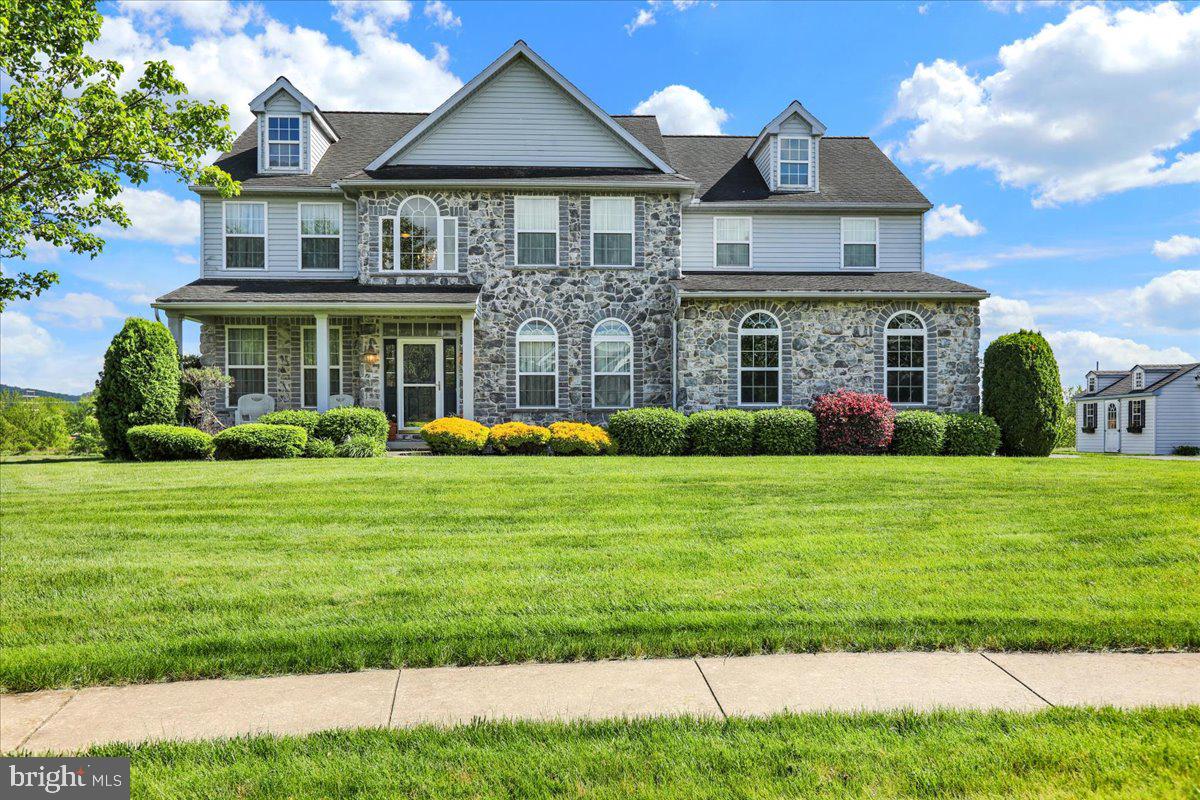 Welcome to your dream home in the heart of the picturesque Oley Valley School District! Tucked away at the end of a quiet cul-de-sac on a no-outlet street, this Greth-built home offers peace, privacy, and high-quality craftsmanship throughout. Enjoy tranquil views with no neighbors behind you, as the private backyard backs up to scenic farm fields. Step inside to a stunning gourmet kitchen featuring granite countertops, tile backsplash, stainless steel appliances, a double oven, abundant cabinetry, a walk in pantry, and a large center island—perfect for entertaining and everyday living. Enjoy your morning coffee in the sunny breakfast area, the enclosed patio, or the cozy sunroom with vaulted ceiling. The kitchen flows seamlessly into a bright family room with cathedral ceilings, large windows, and a gas fireplace with a custom mantel. A versatile study off the family room offers the potential for a fifth bedroom. You'll also find a formal living room off the foyer and an elegant dining room with tray ceiling, and hardwood floors. Upstairs, discover four spacious bedrooms and a wide hallway. The primary suite is a true retreat with French doors, a large walk-in closet, and a luxurious bathroom featuring a soaking tub and generous tiled shower. There is also a whole home central vacuum system. The spacious basement offers unlimited potential. Bring your ideas...perfect for additional living space. Step outside to a stone paver patio, hot tub enclosure with sliding doors, and beautiful outdoor entertaining areas. Additional features include a two-car garage with custom shelving, a shed, a Generac whole home generator, and much more. Don’t miss your chance to own this exceptional property—schedule your private showing today!