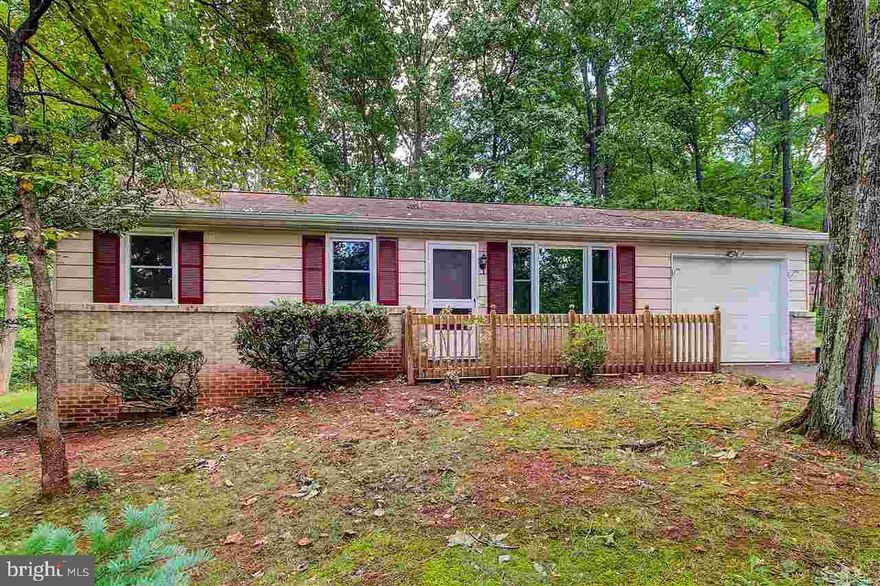 Enjoy the peace and privacy of this updated/upgraded rancher sitting on almost an acre lot.  Great location!  Quiet street!  Updates include new kitchen, stainless steel appliances, bathroom, flooring, lighting, paint, newer windows, and more.  Plenty of storage with large basement, one car attached garage, and storage shed.  Move right in!