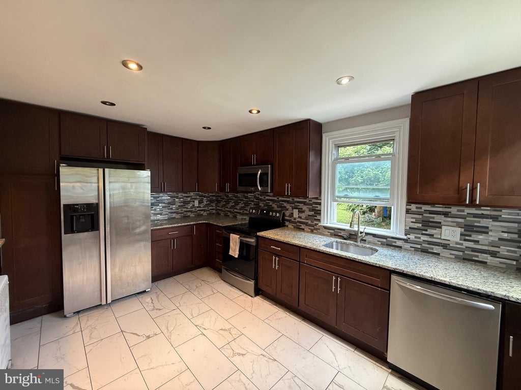 Photo of 2413 N 50th Street, PHILADELPHIA, PA 19131 (MLS # PAPH2626130)