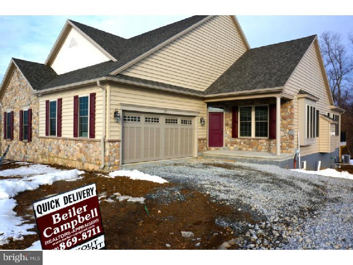 Tired of shoveling snow this winter? Let us do it for you! This quick delivery beauty is gorgeous and ready for you.(Pictures will be posted shortly.) If you've seen our other cottages, then come see the changes we put in this one. The first floor has 2 bedrooms and 2 baths, an open living and dining room, a sunroom with a great view, and a beautifully upgraded kitchen with stainless appliances, granite counters, an island and hardwood floors. This home also comes with a 1600 square foot walkout basment a mud/laundry room, and a two car garage. Honeycroft Village is an active adult community which offers care free living where the yard work and snow shoveling are all taken care of. Call our sales agents today for more information or visit our sales center Tuesday thru Sunday from 1-4pm or by appointment. Price on this home reflects our current incentive.