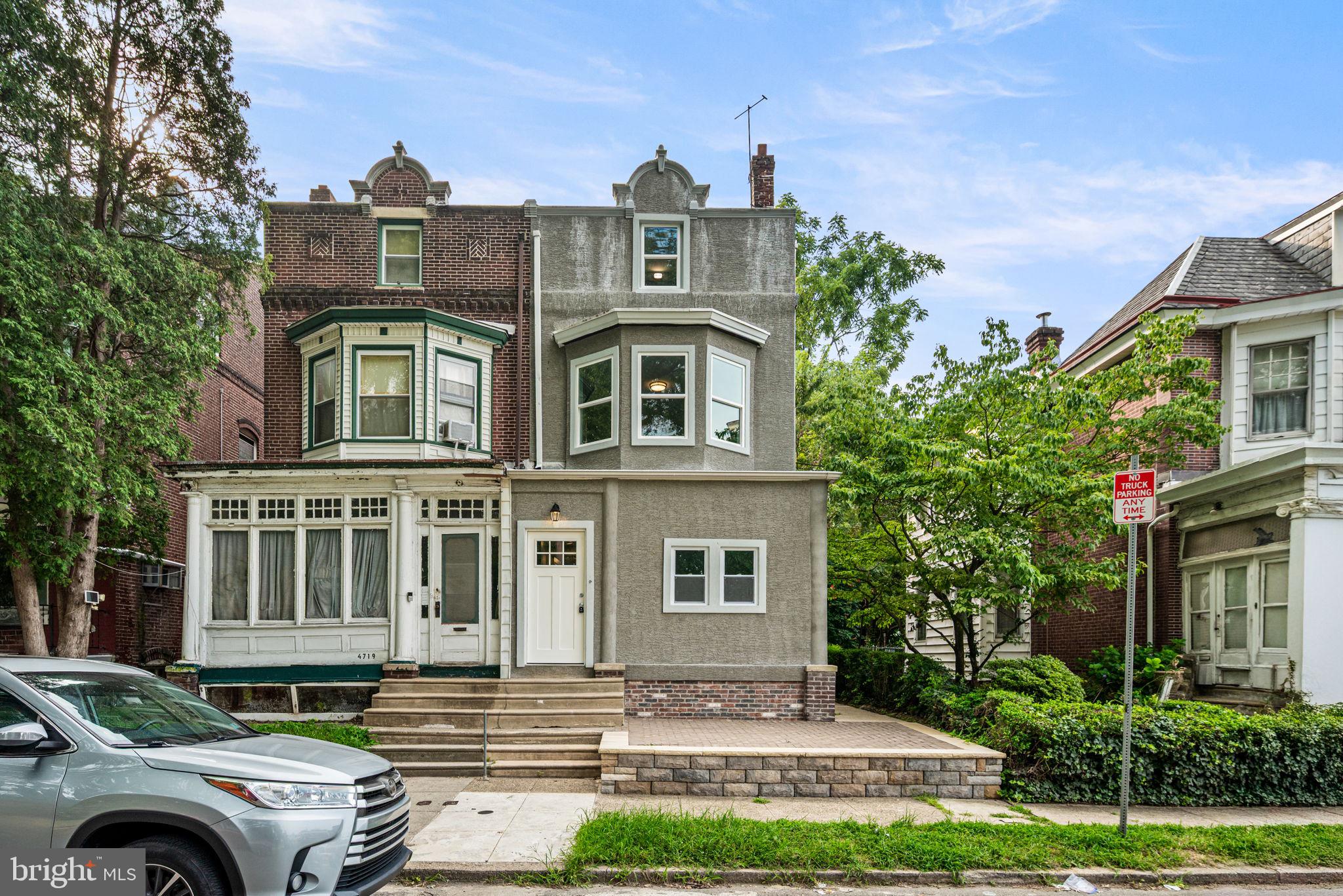 Welcome to 4717 Northwood St – a fully renovated gem blending historic charm with modern comfort, situated on a tree-lined block in Philadelphia. This stately Victorian twin has been stripped to its studs and brought back to life with thoughtful design, high-end finishes, and a layout built for today’s living. Nestled directly across from the park, the home offers unobstructed views of green space from the front, creating a serene and open feel rarely found in city living. This spacious residence spans three beautifully finished levels, plus a fully finished basement with both interior and private exterior entrances. From the moment you arrive, you'll be drawn in by its striking curb appeal, complete with a fresh stucco façade, clean architectural lines, and a custom elevated paver front patio - perfect for enjoying your morning coffee while overlooking the park. Inside, the main level welcomes you with wide-plank luxury vinyl flooring, recessed lighting, and a large, open-concept living and dining area that flows seamlessly into a designer kitchen. The kitchen features soft-close shaker cabinets, quartz countertops, brass hardware, stainless steel appliances, and a bold statement light fixture that anchors the space. A convenient half bathroom, a spacious mudroom, and direct access to the backyard round out the first floor. On the second level, you’ll find three generously sized bedrooms, each with dedicated closet space, along with a fully renovated full bathroom featuring sleek tilework and stylish finishes. The third floor offers two additional bedrooms and another beautifully updated full bathroom, providing plenty of privacy and flexibility for larger households, guests, or work-from-home setups. The finished basement is a true bonus space, featuring its own HVAC zone, a full bathroom, and a private exterior entrance - making it ideal for a guest suite, home gym, creative studio, or potential income-producing unit. A newly installed French drain system ensures long-term protection, while the three-zone HVAC system delivers comfort on every level. Out back, enjoy a deep lot that backs up to a wooded area, offering both privacy and a natural setting. The rear yard is a true retreat, featuring a custom multi-tiered paver patio and a grassy lawn - perfect for entertaining, relaxing, or enjoying peaceful outdoor moments. With all-new systems, windows, mechanicals, and finishes throughout, 4717 Northwood St is truly move-in ready. This is a rare opportunity to own a like-new home with timeless Victorian character, modern upgrades, and a premium location that continues to grow in value. Don’t wait - schedule your showing before it's to late!