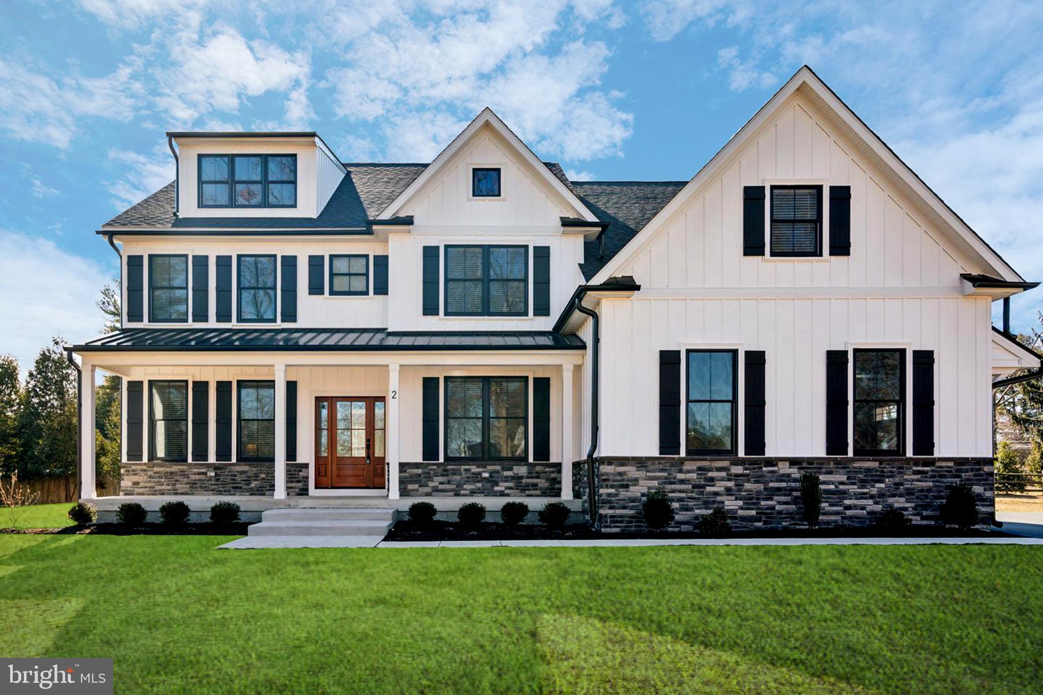 Who will be the lucky first owners of this stunning custom home? This exquisite residence offers over 4,500 square feet of finished living space, nestled in a cul-de-sac, on a beautiful one-acre lot. From the moment you arrive, its curb appeal captivates, setting the tone for the elegance that awaits inside. Step onto the charming front porch, and make your way through the front door into a bright and welcoming foyer, where natural light pours in, highlighting the home’s impeccable craftsmanship. To the right, a formal dining room boasts custom wainscoting and a statement light fixture, creating the perfect ambiance for hosting unforgettable gatherings. To the left of the foyer, a versatile flex room with glass French doors offers endless possibilities—perfect as a home office, playroom, cozy den, or even a first-floor guest suite. Next to the flex space, you'll find a convenient half bathroom. As you move deeper into the home, you’ll find the heart of the home—a spacious, open-concept living area that seamlessly blends the living room, informal dining area, and kitchen. The living room is anchored by a gas fireplace, adding warmth and ambiance. The kitchen is a chef’s dream, featuring custom white perimeter cabinets, white quartz countertops, and a farmhouse sink. The oversized island seats four and boasts black leathered countertops paired with custom white oak cabinetry. Completing this space is a high-end GE Café appliance package, including a 36” range. Just behind the kitchen, a huge walk-in pantry with a second refrigerator provides ample storage and prep space. Nearby, a butler’s pantry connects the kitchen to the living and dining areas, adding both function and charm. The mudroom offers convenient access to the oversized three-car garage, keeping daily life organized and clutter-free. A spacious covered deck extends seamlessly from the living area, creating the perfect indoor-outdoor flow. Whether you're hosting gatherings, enjoying a quiet morning coffee, or unwinding with a glass of wine in the evening, this space offers added comfort and versatility for relaxing or entertaining. Upstairs, you'll find four generously sized bedrooms, each with custom closets. One bedroom features an en-suite full bath, while the second and third bedrooms share a Jack-and-Jill bathroom with dual sinks and a separate toilet and shower area for added privacy. The owner’s suite is a true retreat, showcasing a vaulted ceiling and a shiplap feature wall. The spa-like en-suite bathroom features a stand-up shower, separate soaking tub, a private water closet, and two huge linen closets. With more cabinetry and drawer space than most kitchens, storage will never be an issue. The expansive walk-in closet is divided into two sections—one of which is large enough to function as a small office or dressing area, while the other, complete with a window, makes for a perfect vanity space. For more added convenience, there is a large laundry room on the 2nd floor as well. The lower level offers both finished and unfinished spaces with high ceilings. The finished area includes a comfortable living space, a fifth bedroom, and another full bathroom, making it ideal for guests or extended family.
Just minutes from shopping, restaurants, nightlife, and scenic hiking trails, you'll never be short on things to do. The SEPTA train station is less than a mile away, and you’ll have easy access to Routes 309, 73, 76, 276, and 476, making commuting and travel a breeze. Located in Whitemarsh Township and part of the highly regarded Colonial School District, this home truly offers the best of suburban charm and urban accessibility.