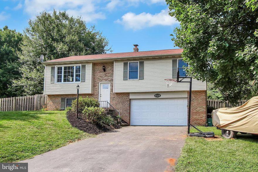 Fresh paint and new carpet throughout this move-in ready East Hempfield home.  Large fenced yard with 30 foot above ground pool, hot tub, and shed.  Finished family room in the lower level with coal stove.  New garage door and new front door.  All appliances included: refrigerator, washer and dryer.  1-year home warranty included  in sale.  Excellent location close to schools, parks, shopping and major routes.