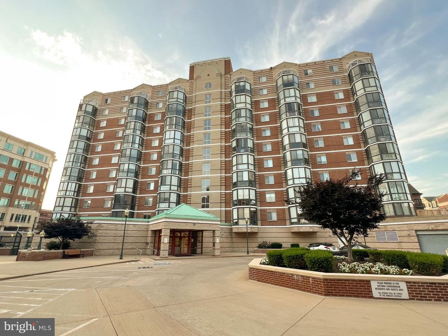 Don't miss out on this bright & spacious condo in the heart of Rockville Town Square. Enjoy car-free living! This unit has all wood flooring throughout, full sized laundry in-unit, an enclosed balcony overlooking the buzzing retail and town square area below, 1 assigned space in the underground parking garage close to the elevators, & a fitness center. Building has on site manager, secure entry via key fob and a call box for guests. Tremendous location puts you within 8 blocks of Rockville Metro and MARC stations, Safeway, Dawson's Market, Walgreens, multiple parks, fitness clubs, restaurants - everything at your doorstep!