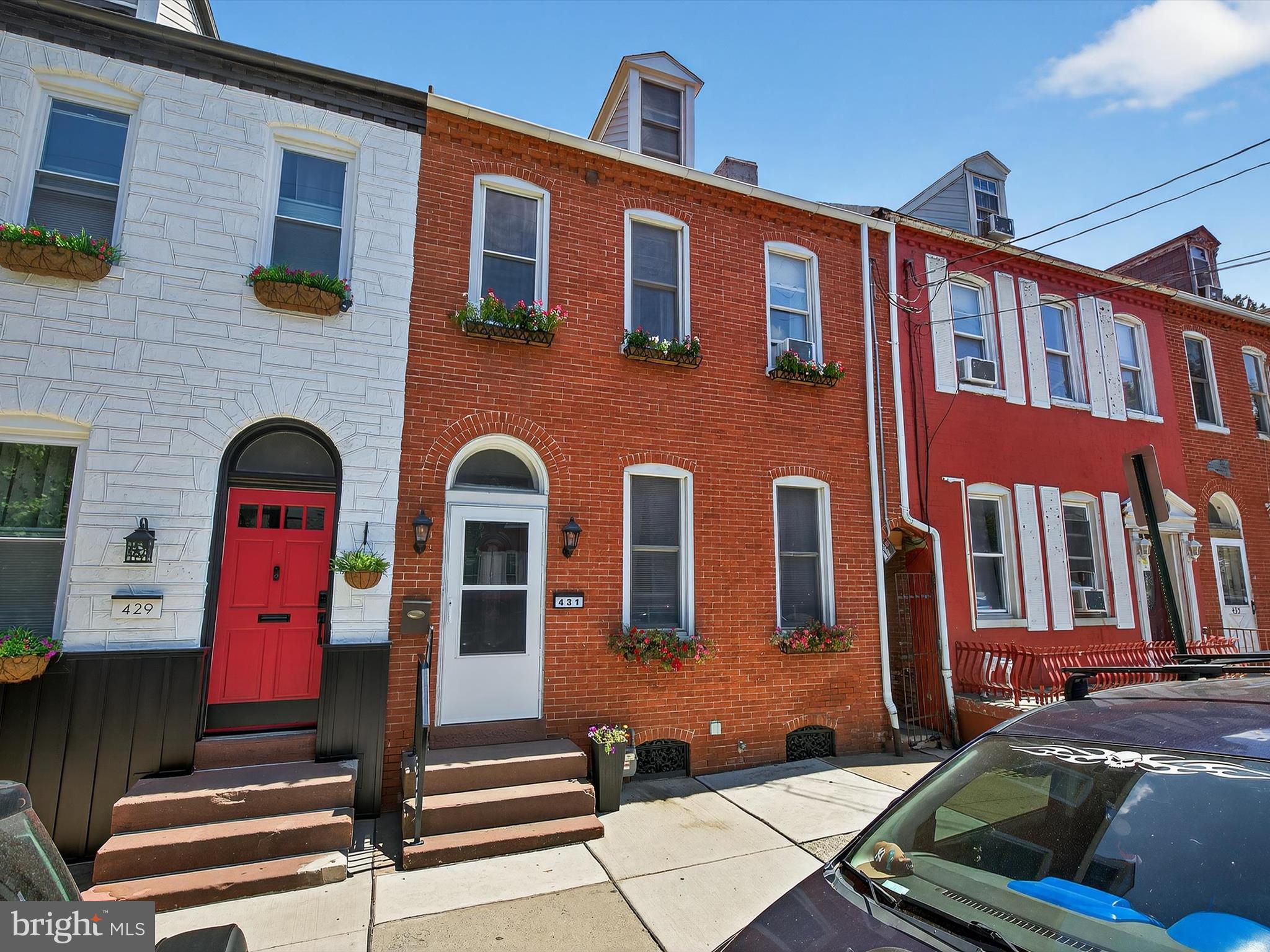 Welcome to 431 S Queen Street, Lancaster. This beauty must be seen in person to appreciate the incredible condition and upgrades!
This fully renovated city gem offers three beautifully finished levels of living space just blocks from downtown. Walk to Southern Market, the Convention Center, and Lancaster Central Park—or simply enjoy the serene view of the historic church right across the street.
Inside, the home showcases a blend of historic charm and modern upgrades: sealed exposed brick, custom tray ceilings, crown molding, refaced cabinetry, and upgraded lighting throughout. The first floor flows seamlessly from a cozy living room with fireplace and recessed lighting, through a sunlit dining room, and into a gourmet kitchen with touch-activated appliances, a built-in pantry with a wine fridge, and huge windows that pour in natural light.
The second floor features three bedrooms, including an expanded primary suite that feels like its own studio apartment—complete with a sitting area, fireplace, and access to a large, L-shaped private balcony with ceiling fans and space for outdoor lounging. A full bath with natural-look tile and a finished third floor with walk-in closet offer even more flexibility—perfect for a guest room, office, or studio.
The fenced backyard is a private oasis with a newly installed patio, fresh concrete sidewalk, manicured lawn, customizable exterior lighting, and tiered perennial garden beds. A versatile bonus room off the yard can serve as a hobby space, small office, or garden shed.
Additional upgrades include:
• New Roof and six new windows
• Three new screen doors
• New front and rear doors
• Newer Electrical Panel installed by Lapp
• Fresh capping on all windows and siding on dormers
• New sidewalk and front entry
• Original stained glass transom
• Window flower boxes for added curb appeal
Please enjoy the floorplans at the end of the photos. Showings begin Friday 7/25—schedule yours today!