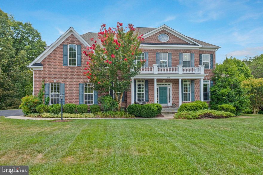 Welcome to 8903 Titleist Trl, your DREAM HOME! This stunning colonial-style brick home offers nearly 7,000 sqft of comfortable living in a quiet, sought-after neighborhood of CALLAWAY GREENS. Built in 2010, this home combines classic charm with modern convenience, making it perfect for both everyday living and entertaining. As you enter, you'll find a two-story foyer with a spiral staircase, setting the stage for the rest of the home. To your right, there’s a spacious office, ideal for working from home, and a bright sunroom that’s great for relaxing. The kitchen is a highlight, featuring granite countertops, plenty of cabinet space, a large island with a gas range cooktop, stainless steel appliances, and a warming drawer. There’s also an additional island space perfect for a cocktail area. Adjacent to the kitchen, the morning room offers a cozy spot for everyday meals and provides direct access to the deck, which is perfect for entertaining and has stairs leading down to the backyard, pond, and walking trails. The living room, just off the kitchen, features two-story ceilings and floor-to-ceiling windows that offer beautiful views of the private backyard pond and walking trails. The beautiful home boasts  five bedrooms, with the primary suite offering dual walk-in closets and a bathroom with a soaking tub, a separate shower with dual shower heads, and double sinks. The fully finished lower level includes a large recreation room, a media room, a bedroom, and a full bathroom. Outdoor living is a true highlight. The screened-in porch offers a comfortable space to enjoy the peaceful surroundings and leads to a private patio. Conveniently located with easy access to Fairfax County Parkway, I-95, commuter lots, the Lorton VRE, and Springfield Metro station, this home is ideal for commuters. You’ll also be close to Laurel Hill Golf Course, The Workhouse Arts Center, local trails, parks, and the town of Occoquan, as well as the shops and restaurants of Liberty. Don’t miss out on this fantastic opportunity. Schedule your tour today!