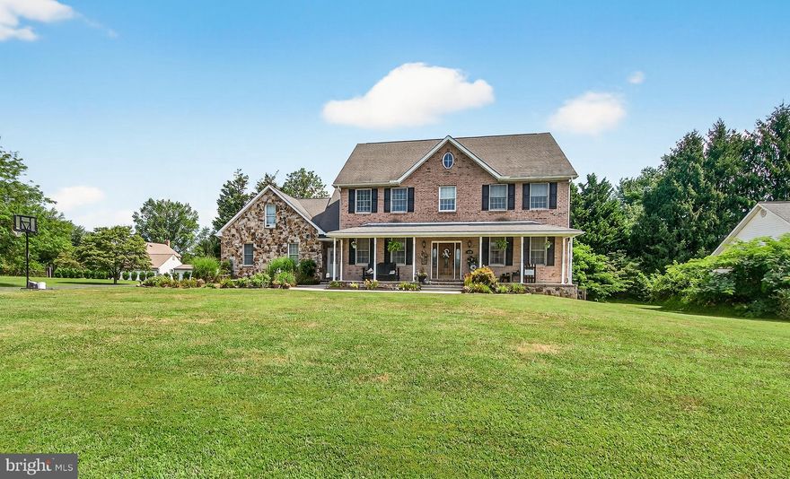 Spacious 4-Bedroom Colonial on Over Half an Acre
Welcome to this stately brick-front Colonial offering 4 large bedrooms and 3.5 baths, set on a generous .57-acre lot. Boasting over 5,100 total square feet—with 3,532 finished above grade and an expansive unfinished lower level with a rough-in for a full bath—this home delivers both space and potential.
Step inside to find White Oak hardwood floors throughout the main level, creating a warm and timeless ambiance. The open floor plan seamlessly connects the living, dining, and kitchen areas, perfect for both entertaining and everyday living. The gourmet kitchen is a chef’s dream, and the home features two separate staircases providing convenient access to the upstairs bedrooms.
Enjoy year-round comfort with dual-zone heating and air conditioning, and take advantage of outdoor living with a deck off the kitchen that includes a beautiful stone fireplace—ideal for relaxing or entertaining under the stars.
This home offers a rare combination of space, style, and future expansion potential in a highly desirable setting.