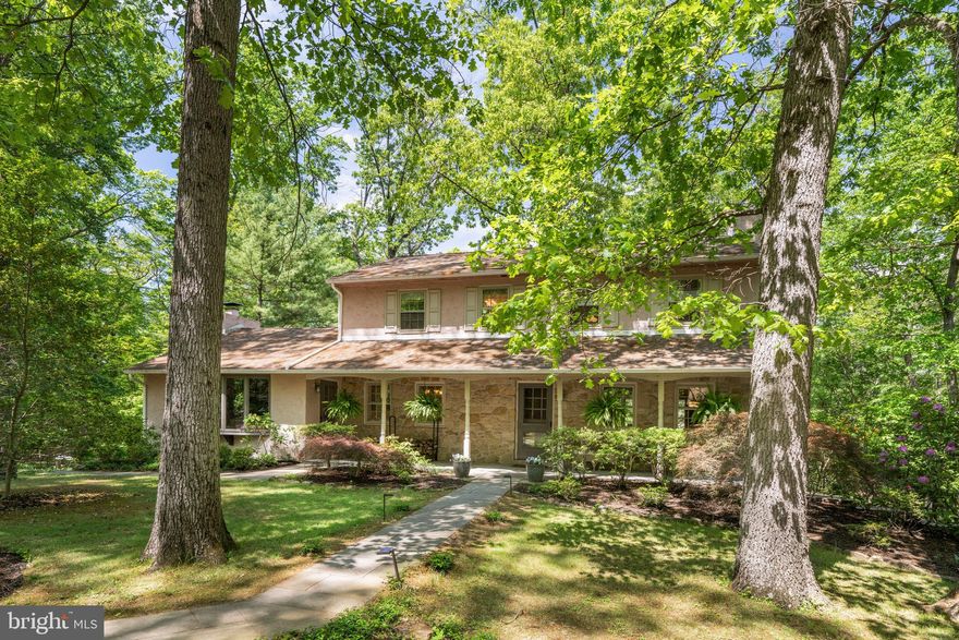 Experience refined country living on this exquisite 2.5-acre estate, featuring a stunning main residence and a charming, income-generating guest house—the perfect blend of privacy, elegance, and opportunity.

The main house offers five spacious bedrooms and 2.5 beautifully appointed baths, designed with timeless sophistication and comfort. From the moment you enter, you’re greeted with gleaming hardwood floors, and an abundance of natural light. The gourmet kitchen is a chef’s dream with high-end appliances, Cambria quartz countertops, and custom cabinetry. The expansive living and dining areas flow seamlessly for entertaining, while a cozy fireplace adds warmth and charm. Lower level includes private entrance with bedroom,  attached partial bath , and separate living area and storage ideal for office or in law suite. 

Step outside to your private oasis—an in-ground pool surrounded by lush colorful landscaping and serene open space, perfect for relaxing or hosting unforgettable summer gatherings.

The guest house, thoughtfully positioned on the property, features a stylish, fully-equipped living space ideal for multi-generational living or income generating.  It’s an exceptional income-producing asset with its own entrance , garage and privacy from the main residence.

Additional highlights include a detached garage, ample parking, and peaceful wooded surroundings. Whether you’re looking for a multigenerational retreat or a exclusive lifestyle with supplemental income, this property offers it all.

Tranquility, prestige, and potential—your dream estate awaits.