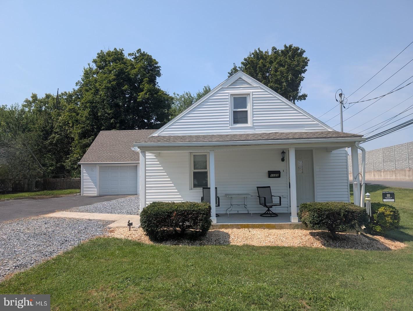 This well maintained home has great curb appeal and a great floor plan! This home features a 1st floor master suite, plus an additional 1st floor bedroom, updated kitchen, hardwoods, 1st floor laundry, a new roof, newer furnace plus mini splits, and so much more! The yard is deceptively large and features a huge outbuilding/storage garage in addition to the oversized attached garage! All this sitting on a "low traffic" street near the Capital City Mall, with easy access to highways! Don't wait to come see this home!