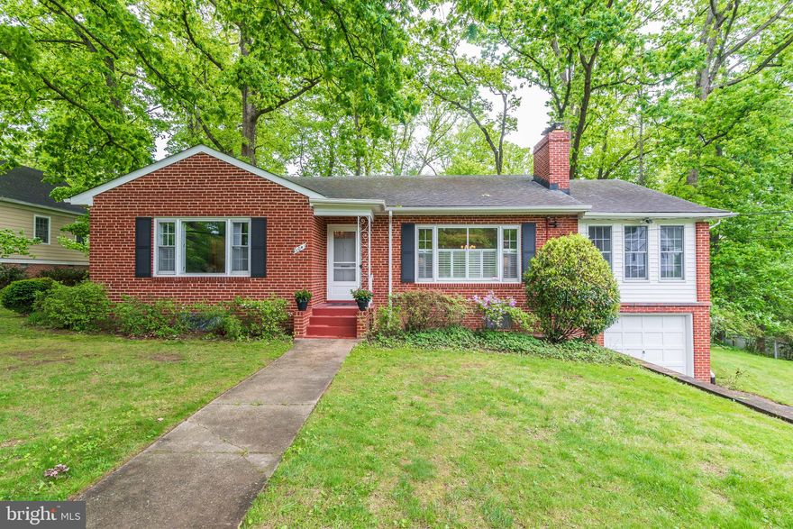 Welcome to this charming home - located on a quiet, tree-lined street in a sought-after neighborhood in the heart of Rockville's West End. The one-level home with large basement offers main level living at its best, with lovely, light-filled space in an open floor plan. A generous foyer provides a warm welcome to the home and its surprisingly large interior. An expansive sunroom flanks one side of the house, adding to the large, inviting living and dining areas. French doors open to a sprawling deck with built-in seating, overlooking the lovely yard and providing extra warm-weather dining and entertaining space. The attractive renovated kitchen offers plenty of cabinetry, granite countertops and stainless steel appliances. Two large bedrooms are located on the main level, and the large sunroom could easily convert to a third bedroom. The full bathroom has been completely renovated, and the primary bedroom has its own ensuite half bath. The lower level of the home provides a full basement with full-height ceilings, suitable for many activities and can be finished into additional living space; it houses a laundry area and an exit to the attached one-car garage. Sited on a generous lot with a front lawn, flowering shrubs and trees, patio, and large fenced back yard, its beautiful setting adds to the appeal of the all-brick, solid home. Offering high ceilings, shining hard wood floors, a fireplace, and new HVAC and hot water heater - the home shows nicely and is ready for its new owner. The home is located within in a quick walk to Metro and the attractions of Rockville Town Center (.6 miles), with easy access to I 270. Enjoy your visit! Offers due Tuesday by 10:00 am.
